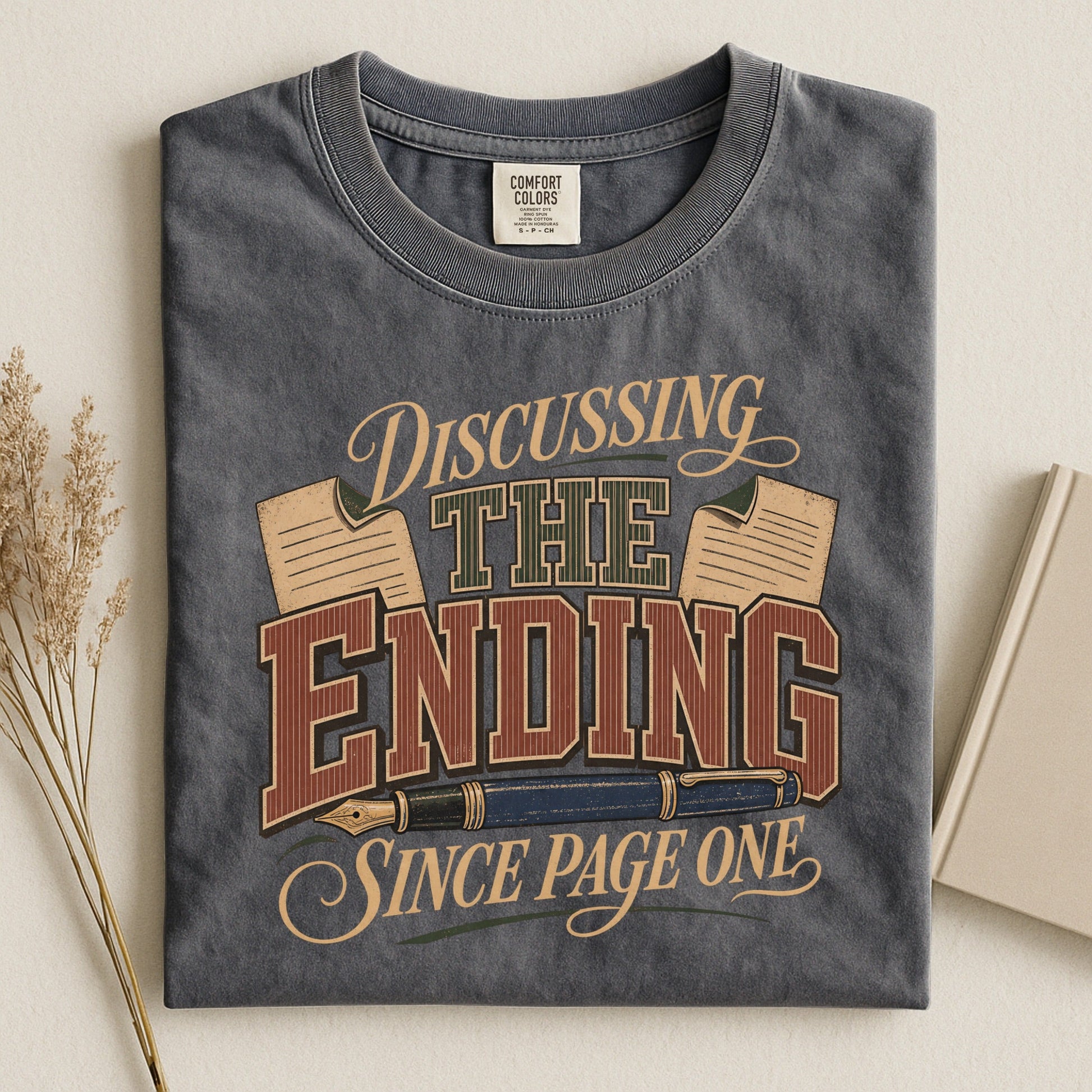 Discussing the Ending Since Page One bookish tee in Pepper, flat lay