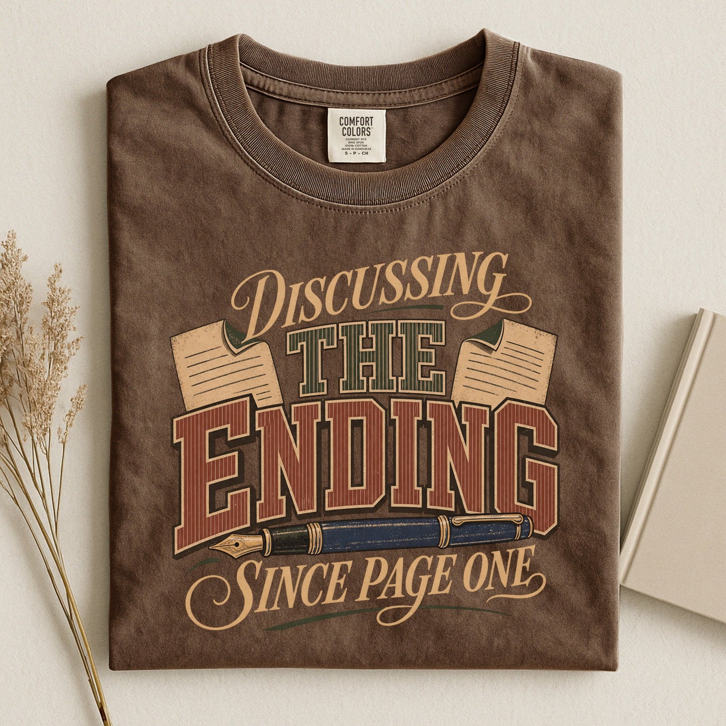 Discussing the Ending Since Page One bookish tee in Espresso, flat lay