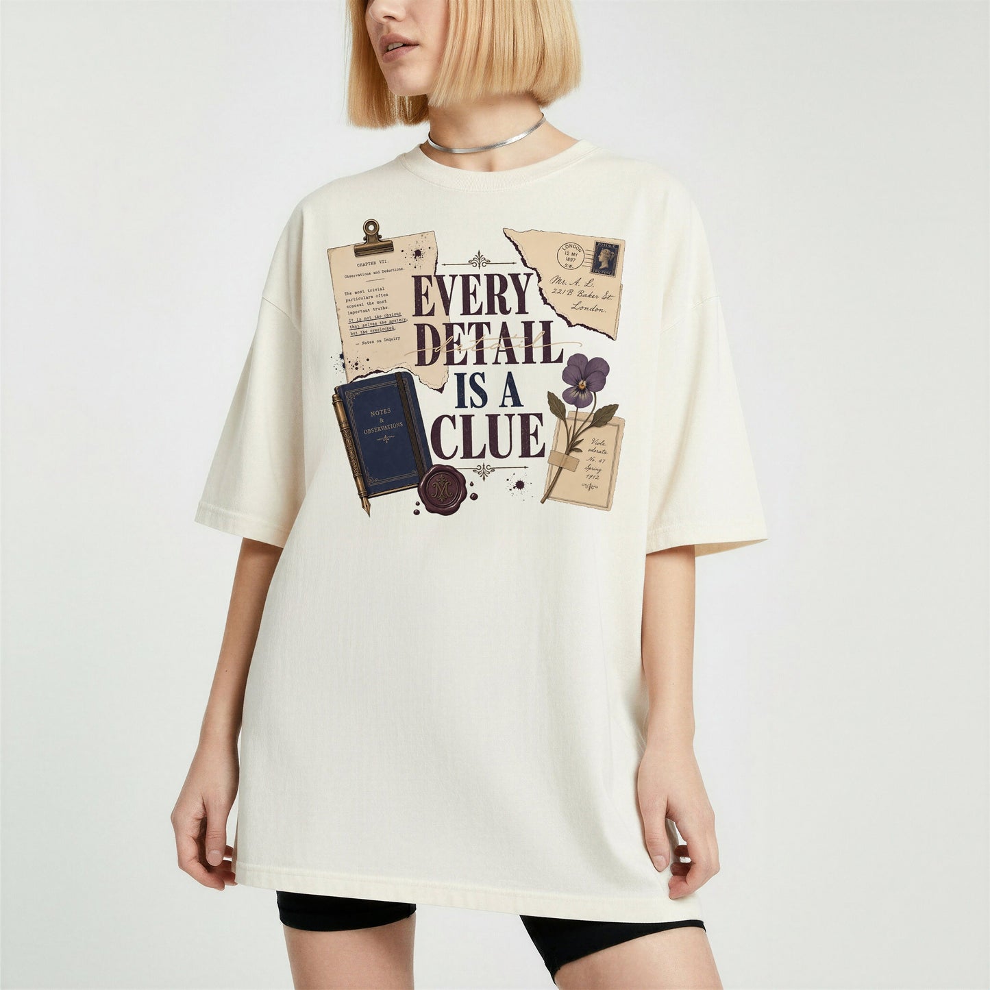 Every Detail Is a Clue bookish tee in Ivory, worn