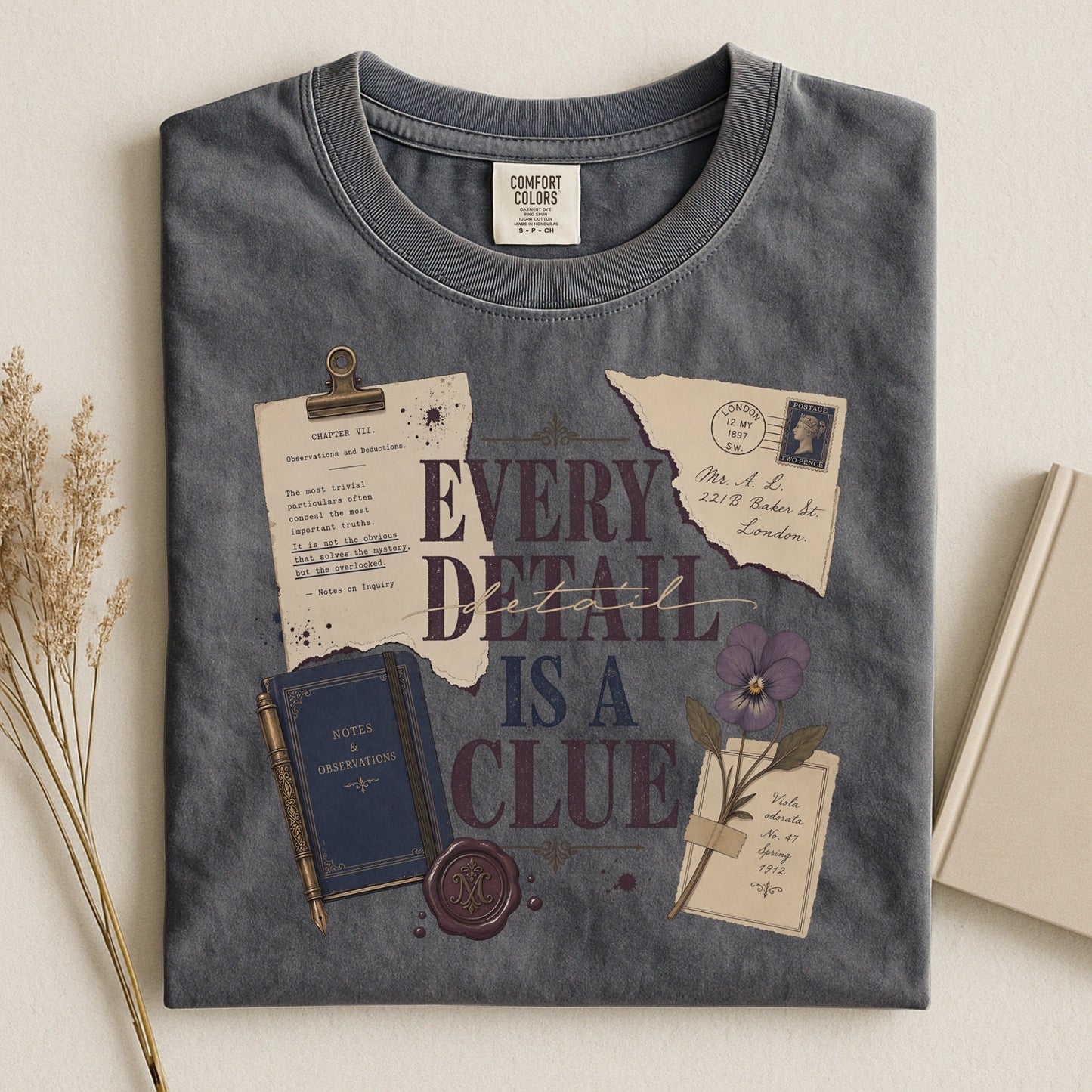 Every Detail Is a Clue bookish tee in Pepper, flat lay