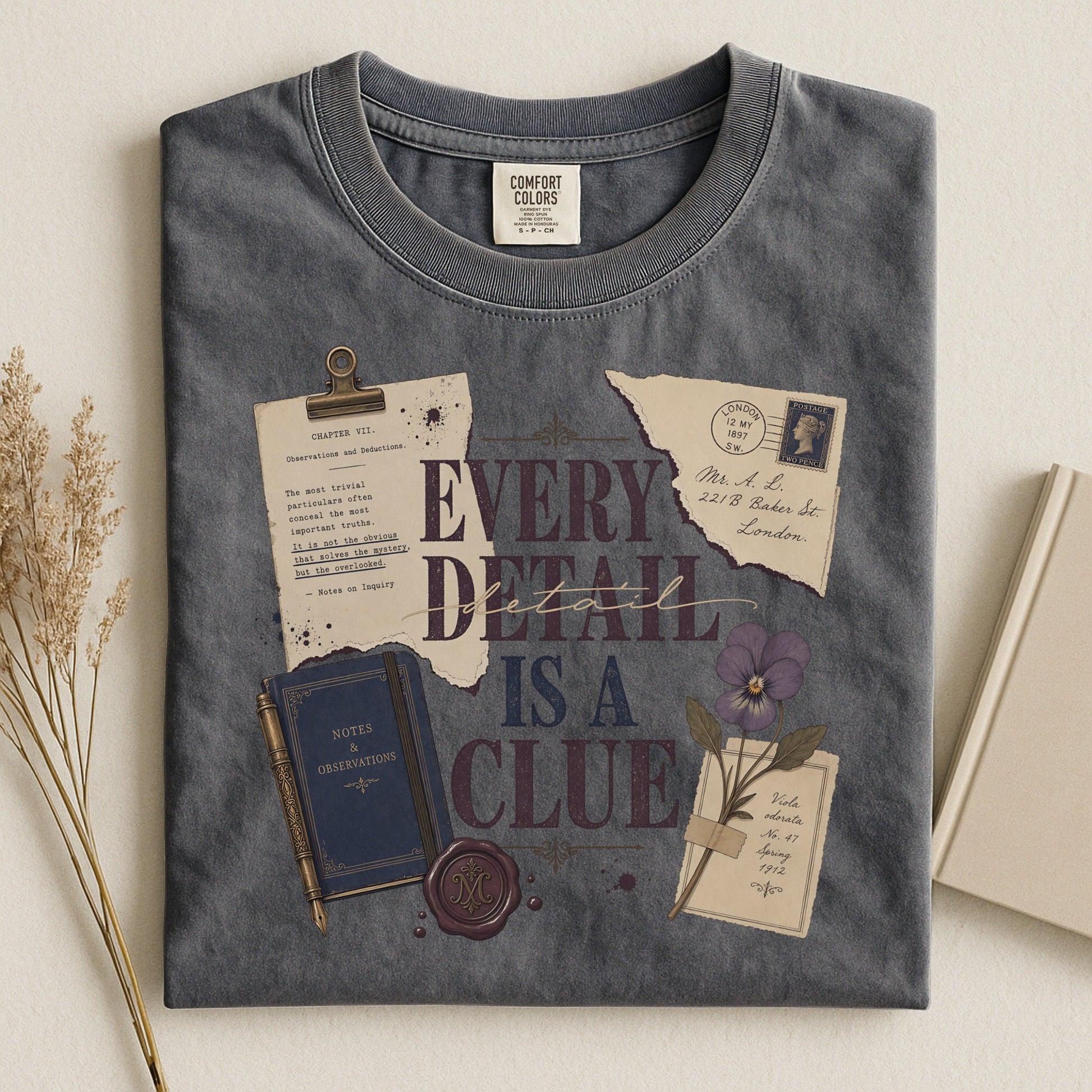 Every Detail Is a Clue bookish tee in Pepper, flat lay