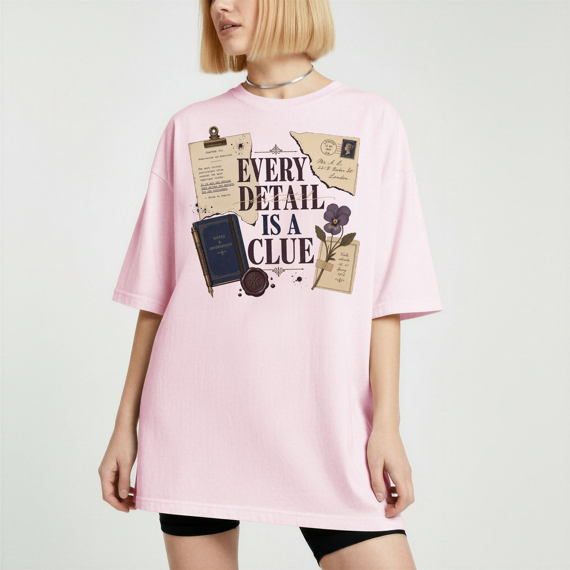 Every Detail Is a Clue bookish tee in Blossom, worn