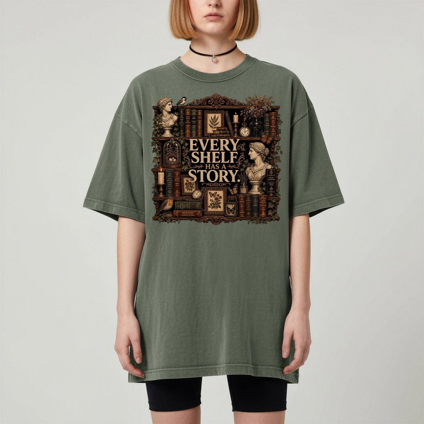 Every Shelf Has a Story bookish tee in Moss, worn