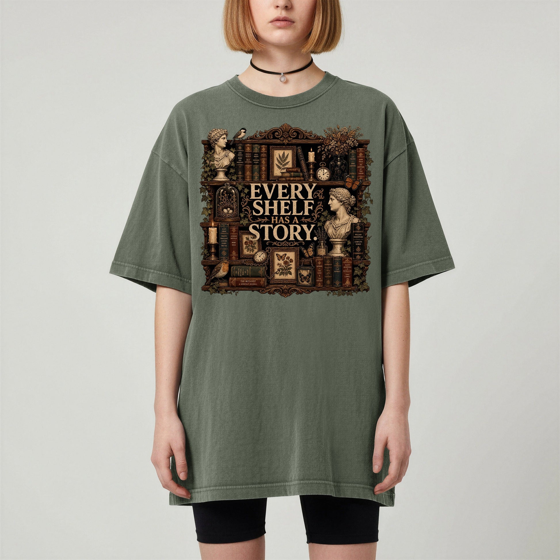 Every Shelf Has a Story bookish tee in Moss, worn