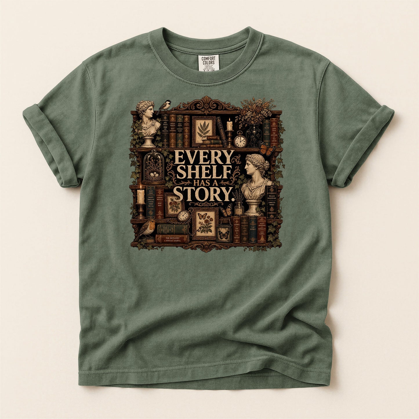 Every Shelf Has a Story bookish tee in Moss, full flat