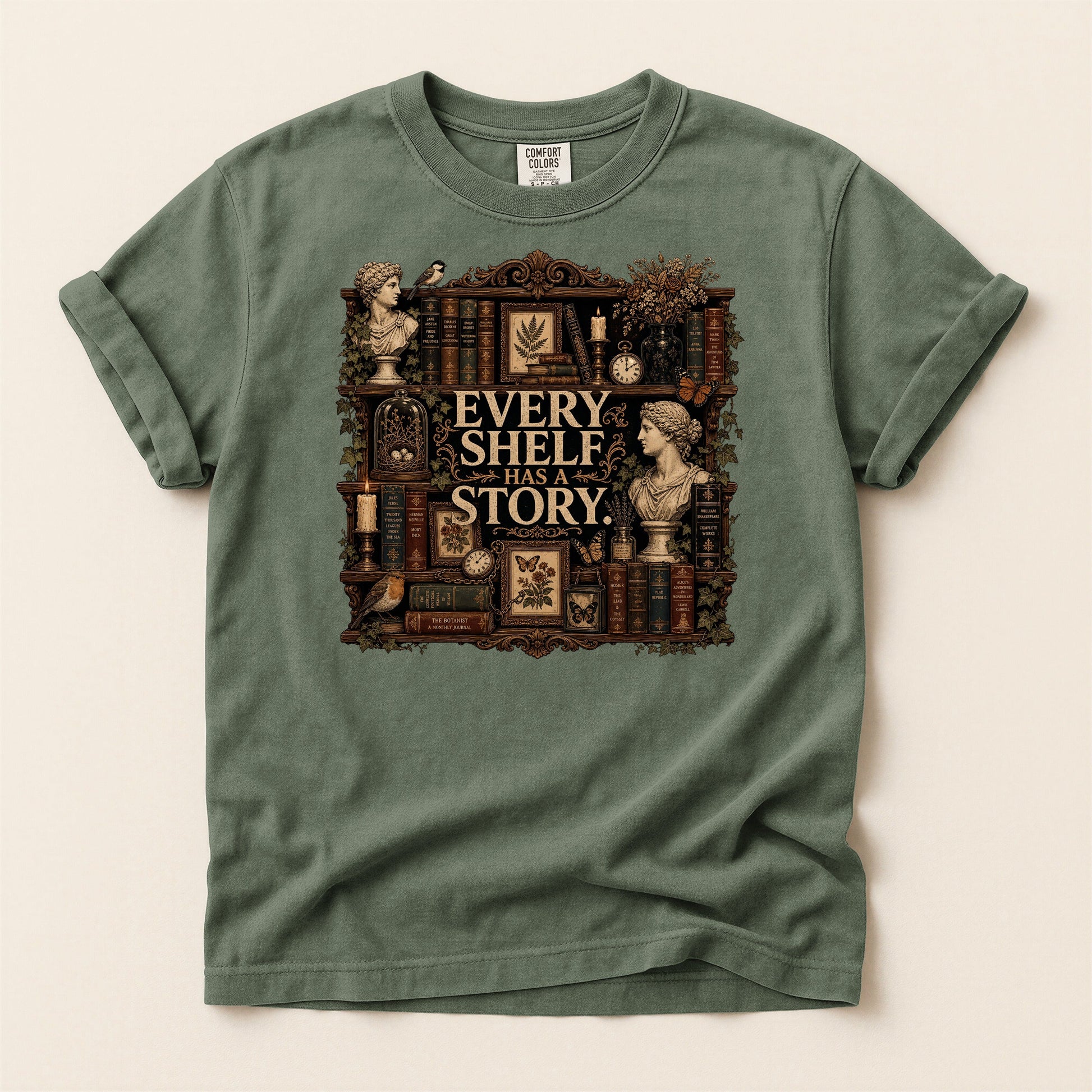 Every Shelf Has a Story bookish tee in Moss, full flat