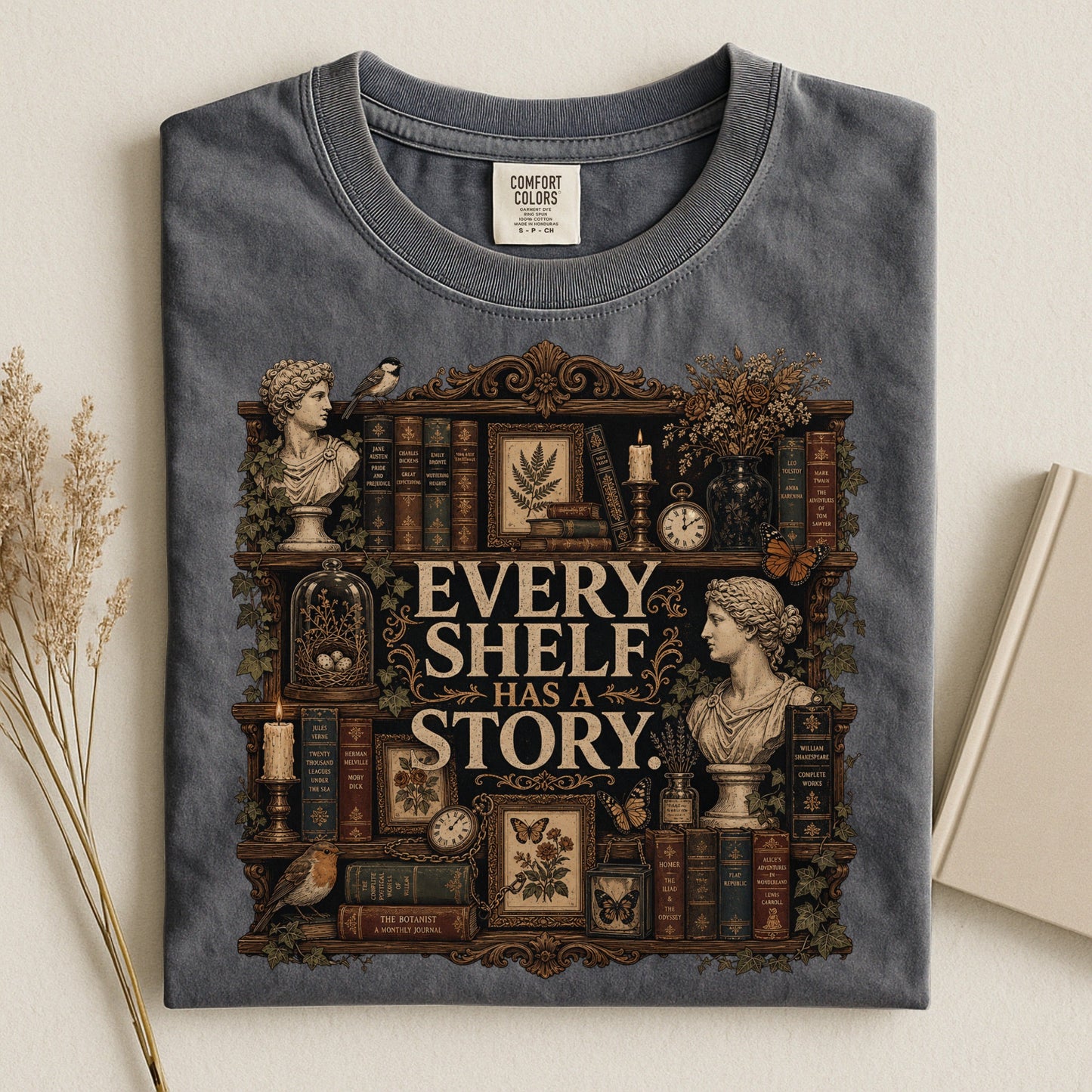 Every Shelf Has a Story bookish tee in Pepper, flat lay
