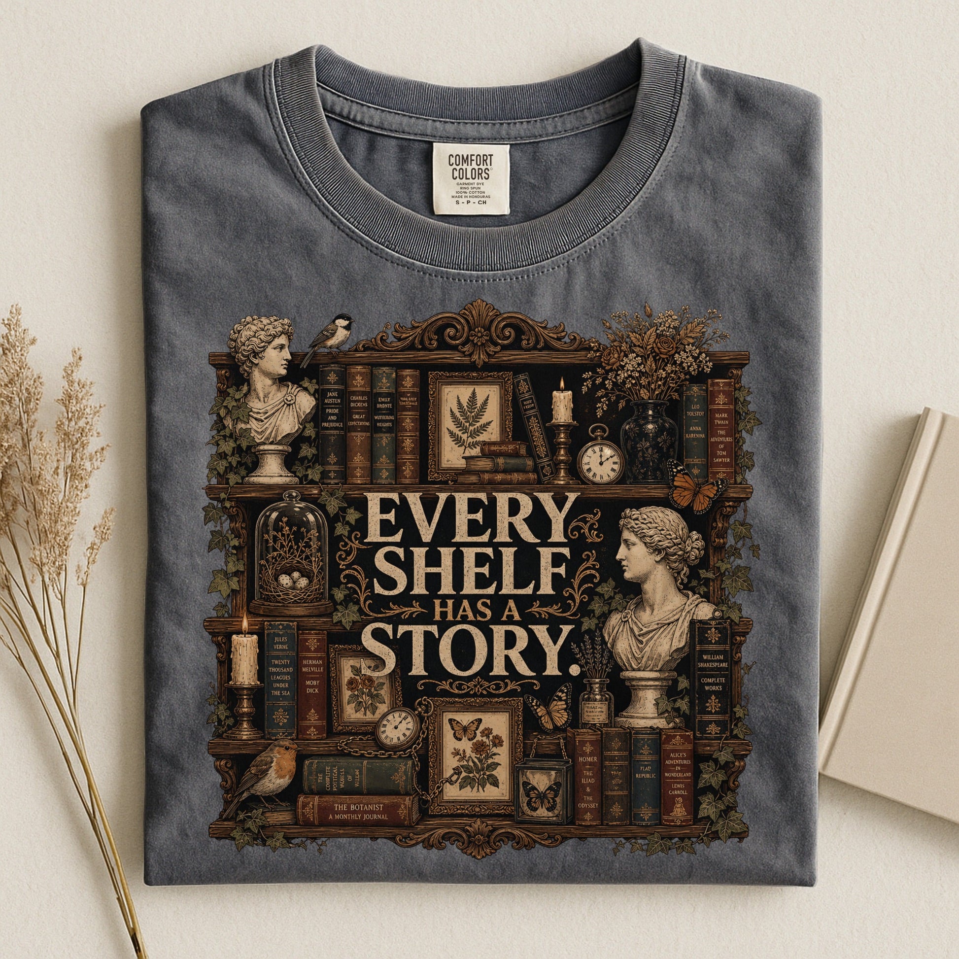 Every Shelf Has a Story bookish tee in Pepper, flat lay