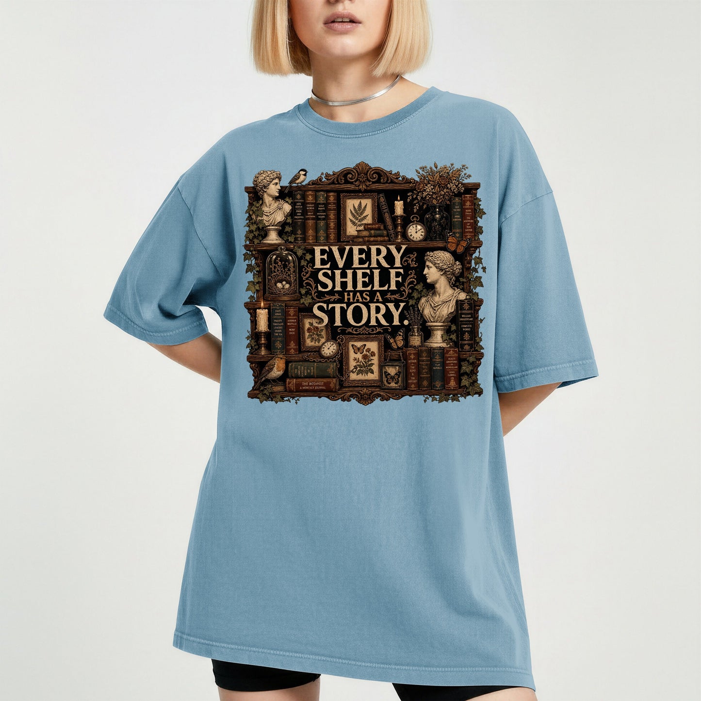 Every Shelf Has a Story bookish tee in Ice Blue, worn