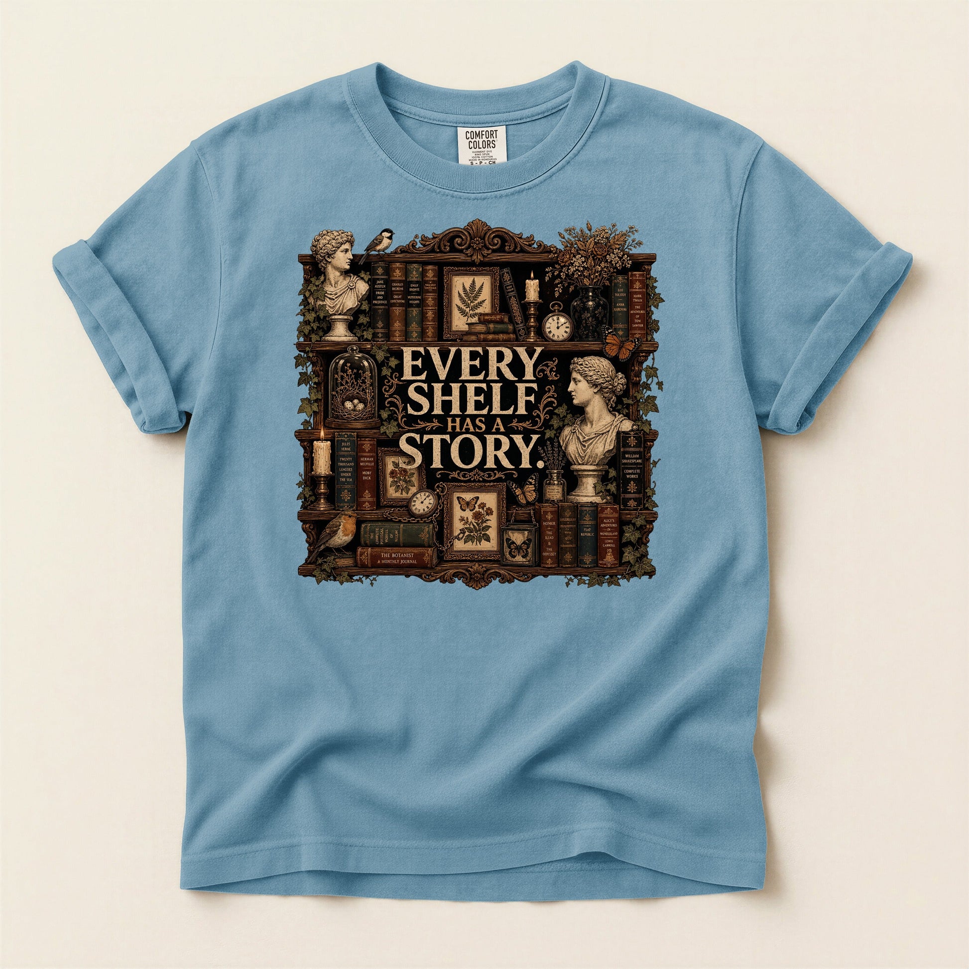 Every Shelf Has a Story bookish tee in Ice Blue, full flat