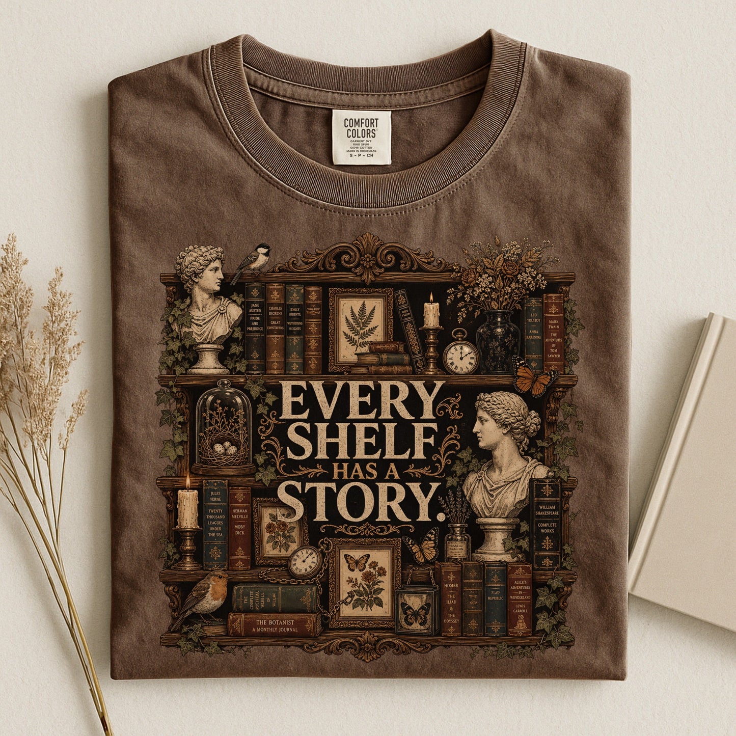 Every Shelf Has a Story bookish tee in Espresso, flat lay