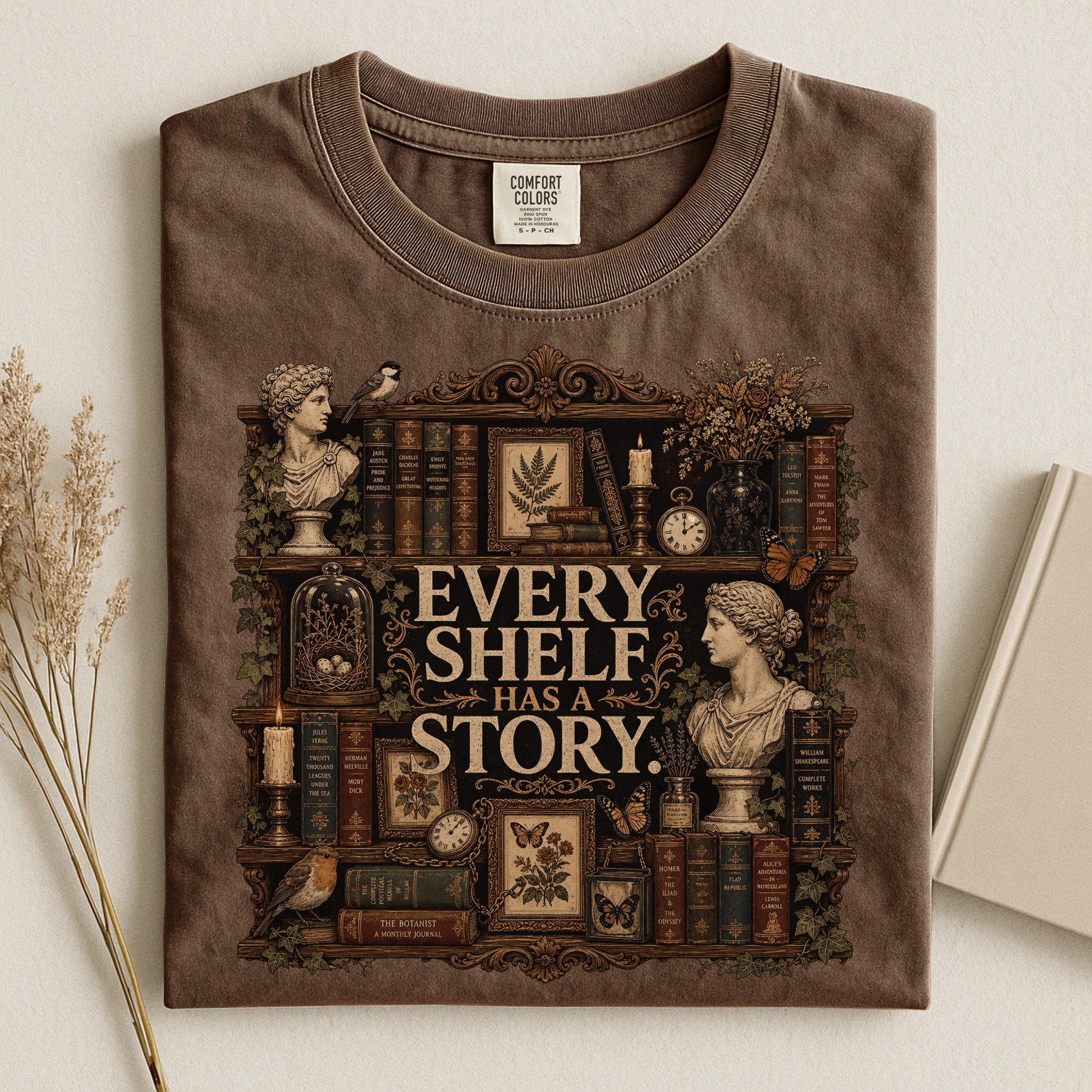 Every Shelf Has a Story bookish tee in Espresso, flat lay