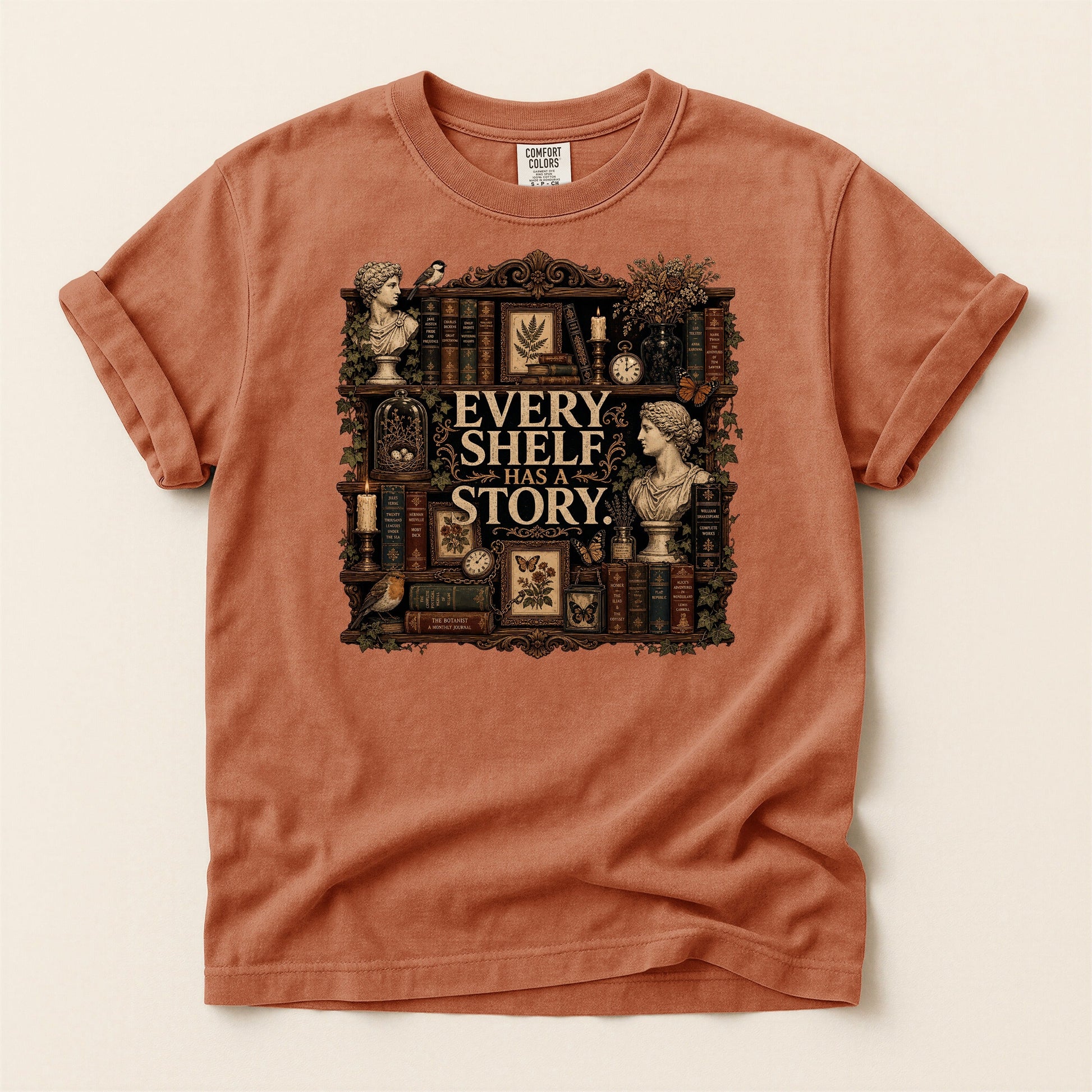 Every Shelf Has a Story bookish tee in Yam, full flat