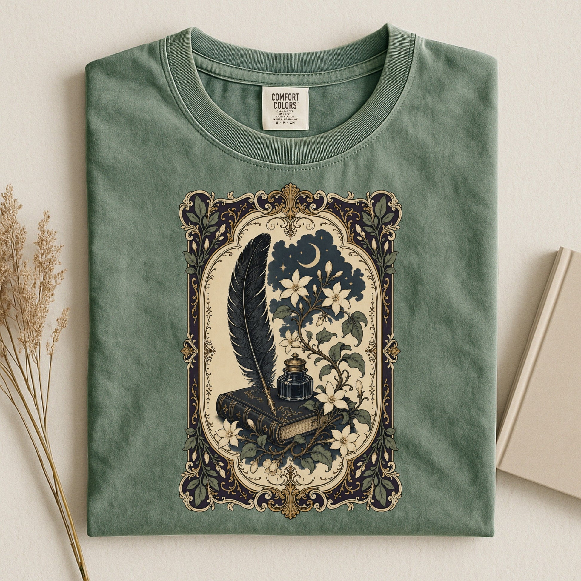 Feather & Wildflowers bookish tee in Moss, flat lay