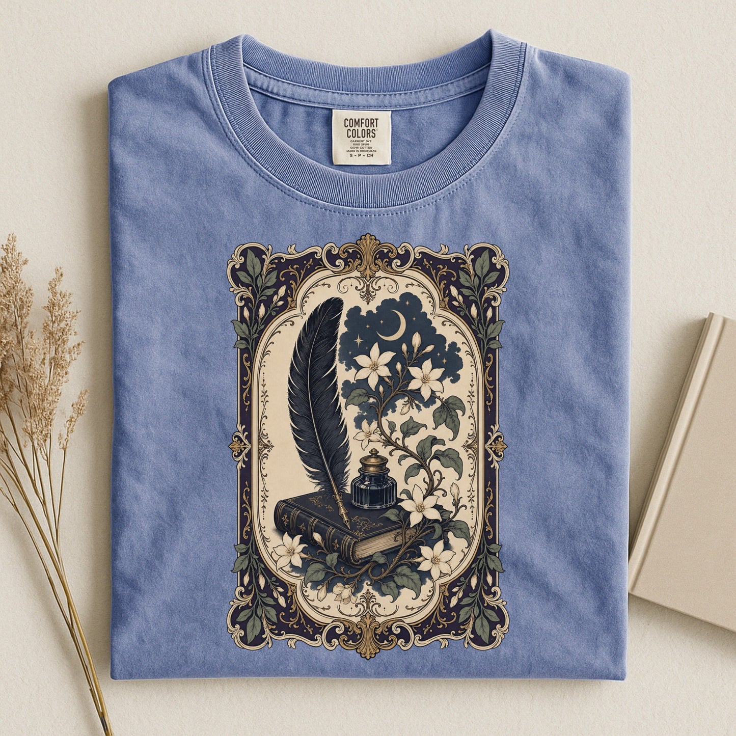 Feather & Wildflowers bookish tee in Blue Jean, flat lay