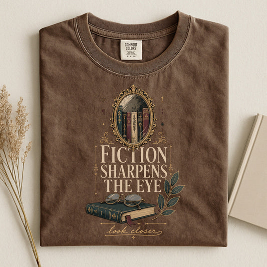 Fiction Sharpens the Eye bookish tee in Espresso, flat lay