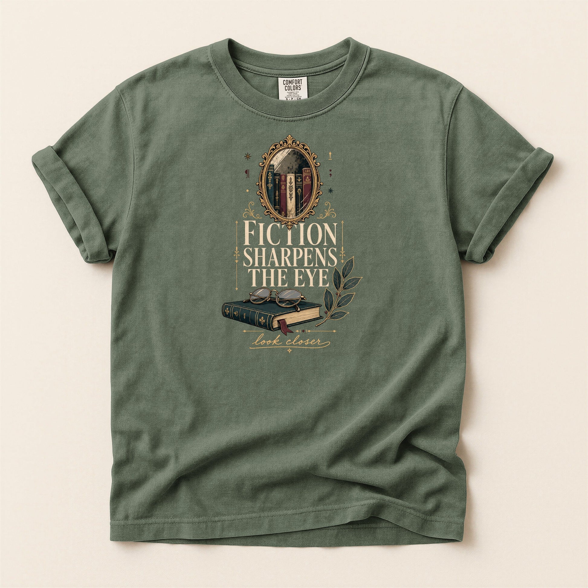 Fiction Sharpens the Eye bookish tee in Moss, full flat
