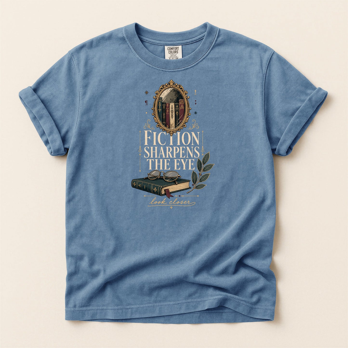 Fiction Sharpens the Eye bookish tee in Blue Jean, full flat