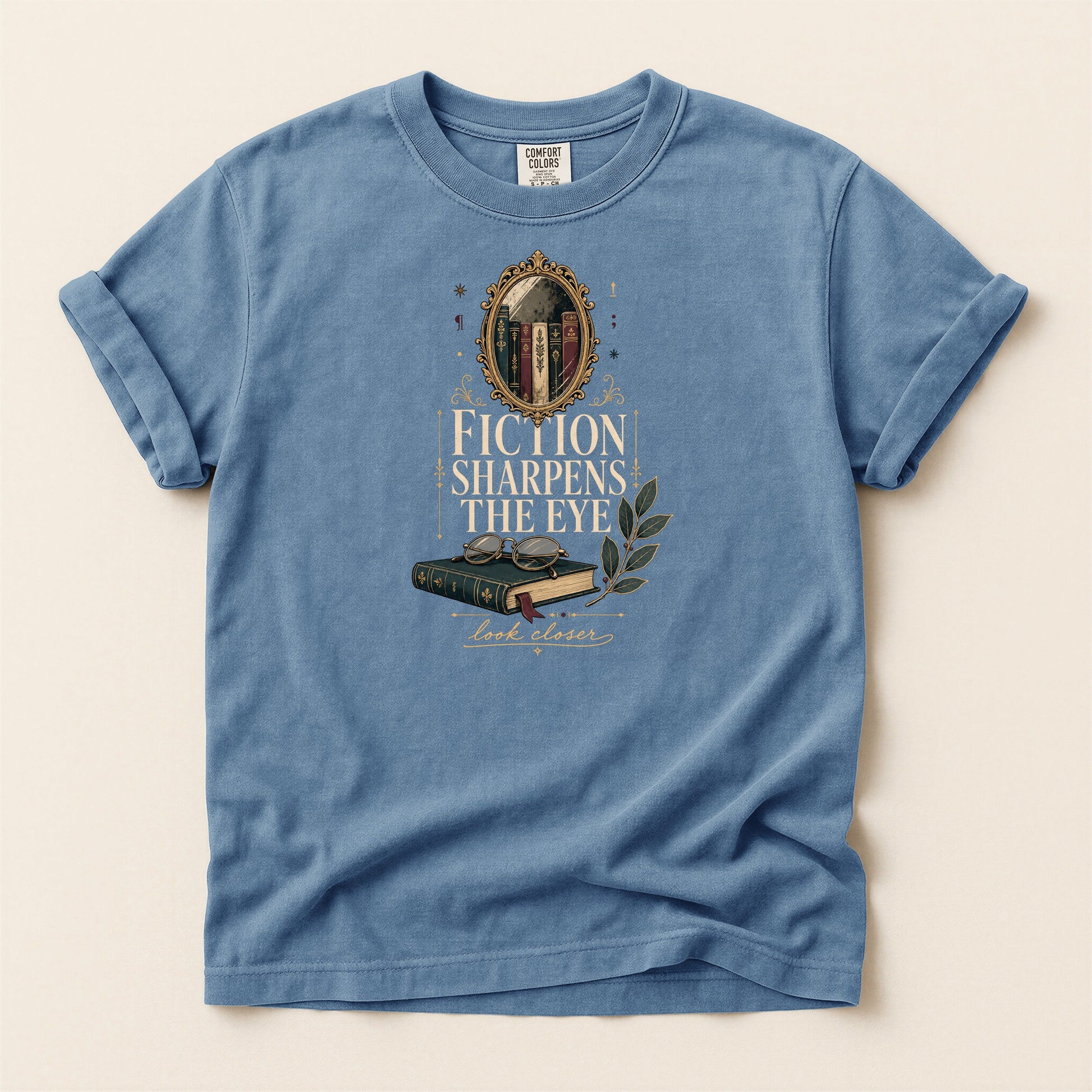 Fiction Sharpens the Eye bookish tee in Blue Jean, full flat
