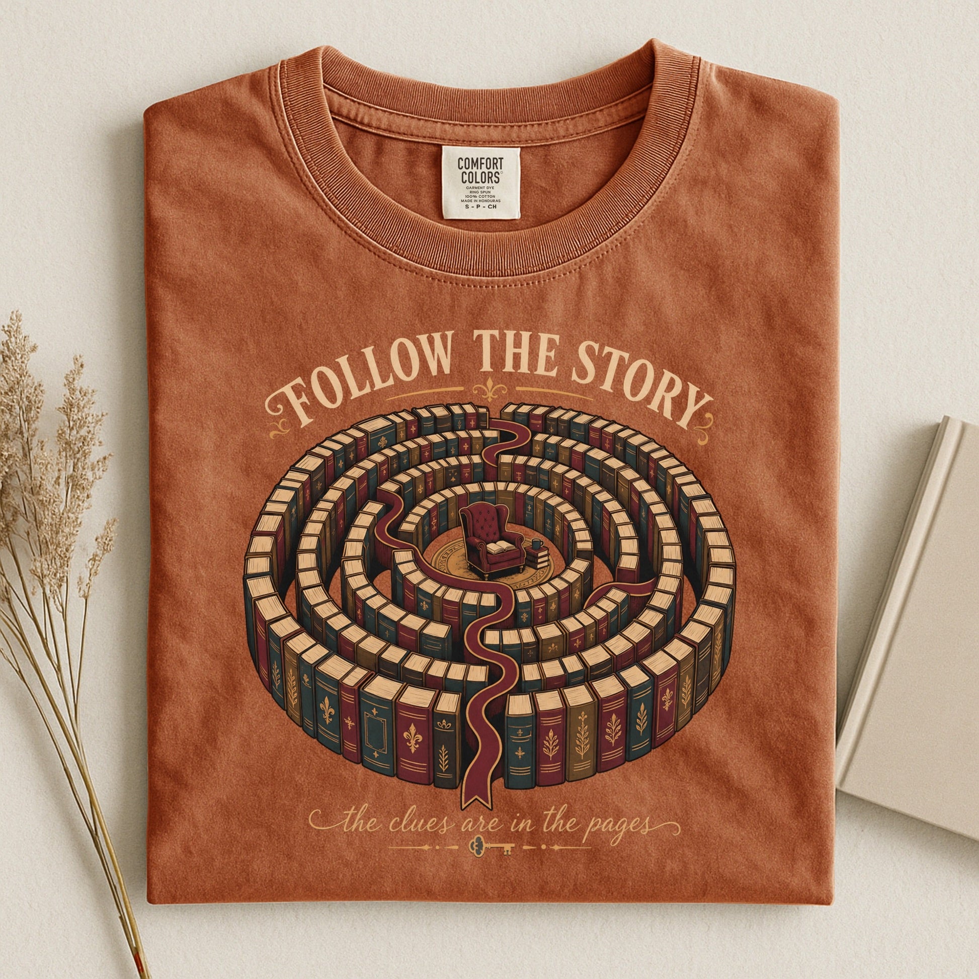 Follow the Story bookish tee in Yam, flat lay