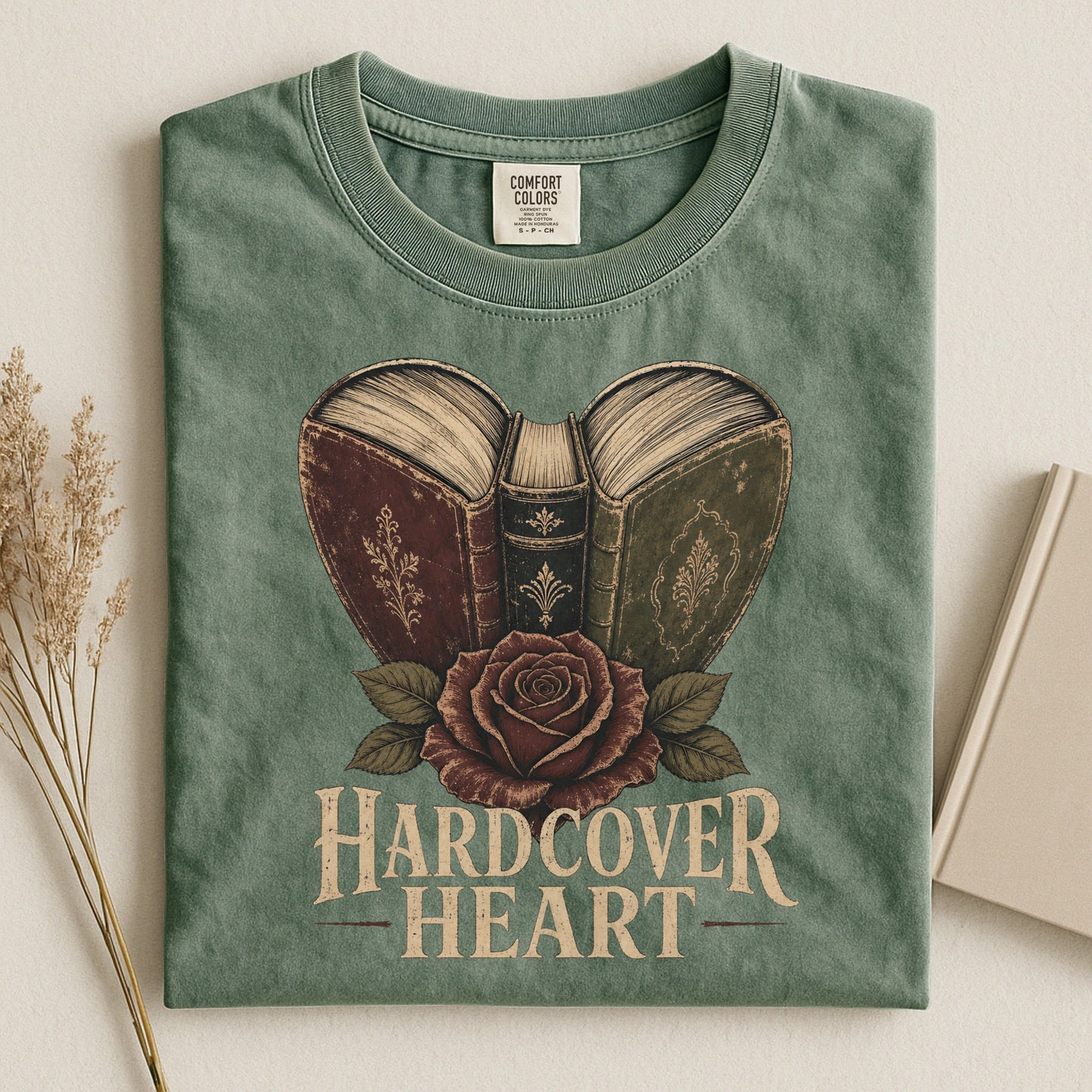 Shelf Love Studio Hardcover Heart t-shirt in Moss, styled flat lay