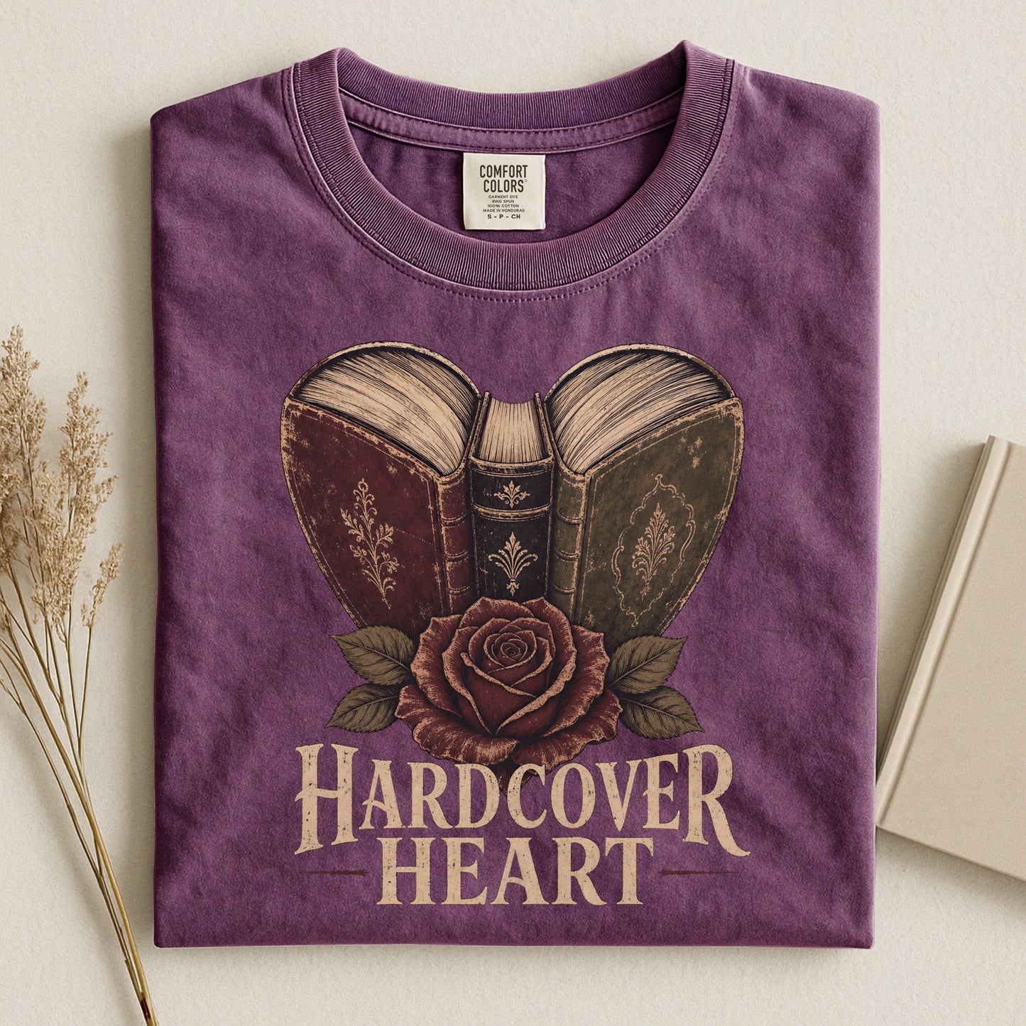 Shelf Love Studio Hardcover Heart t-shirt in Berry, styled flat lay