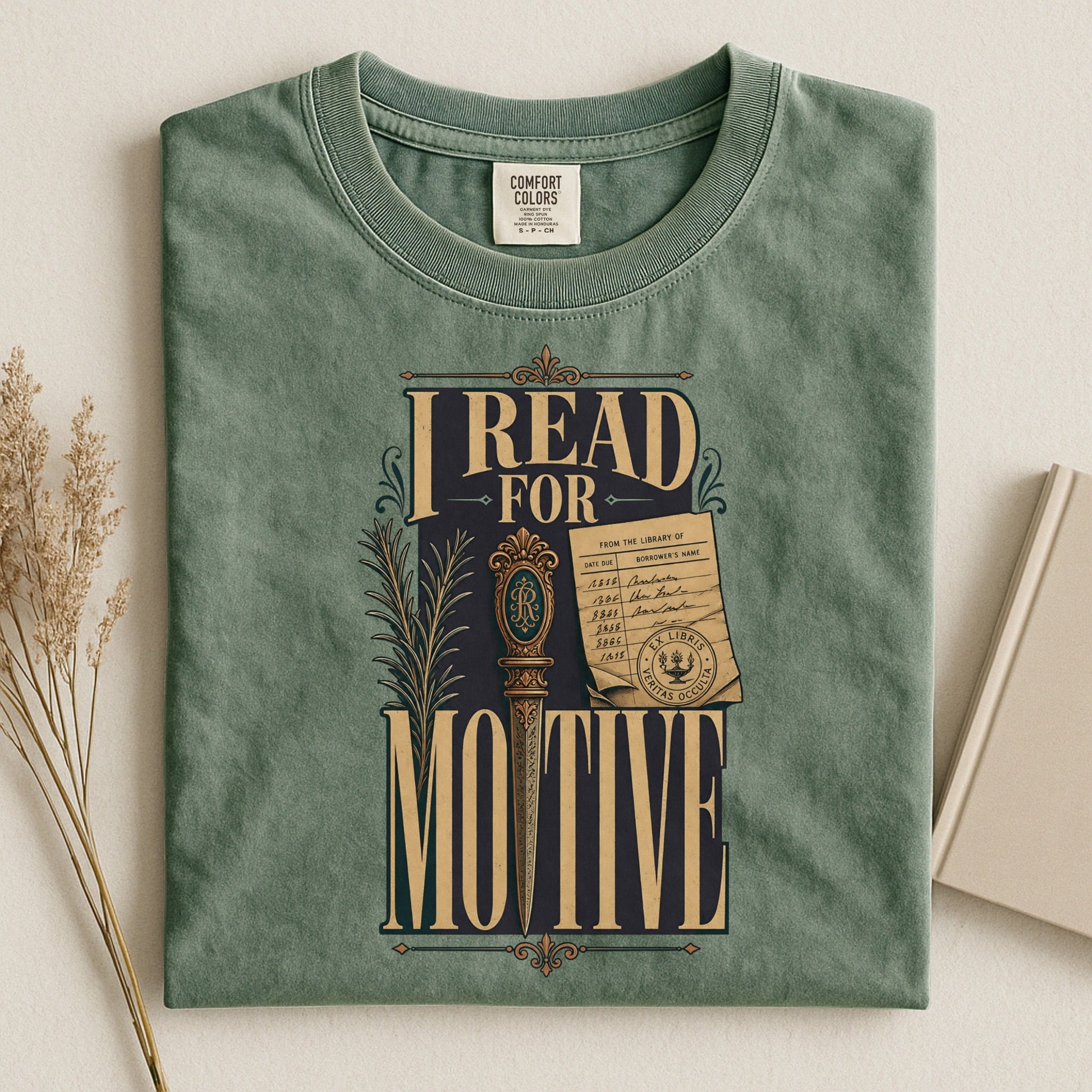 I Read for Motive bookish tee in Moss, flat lay