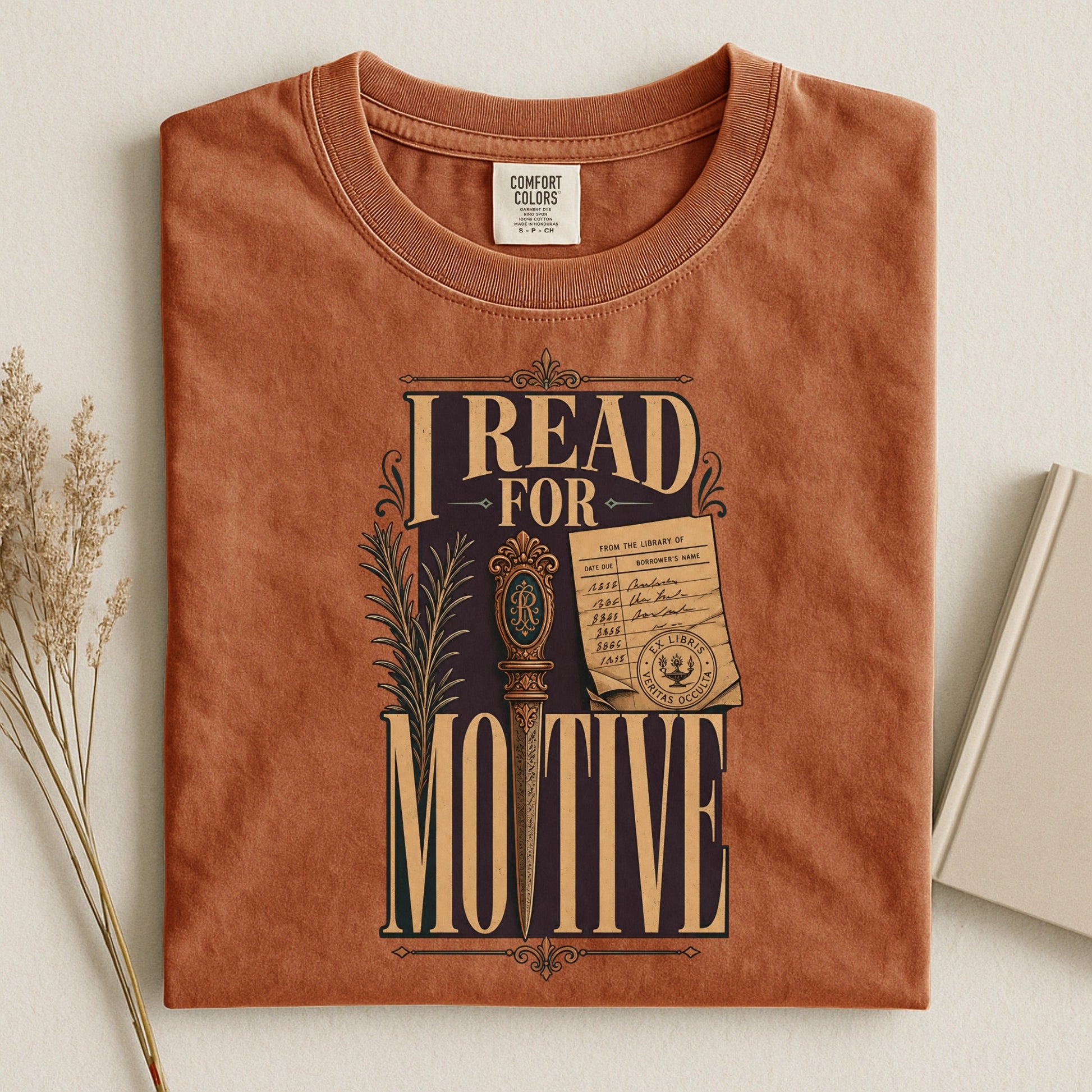 I Read for Motive bookish tee in Yam, flat lay