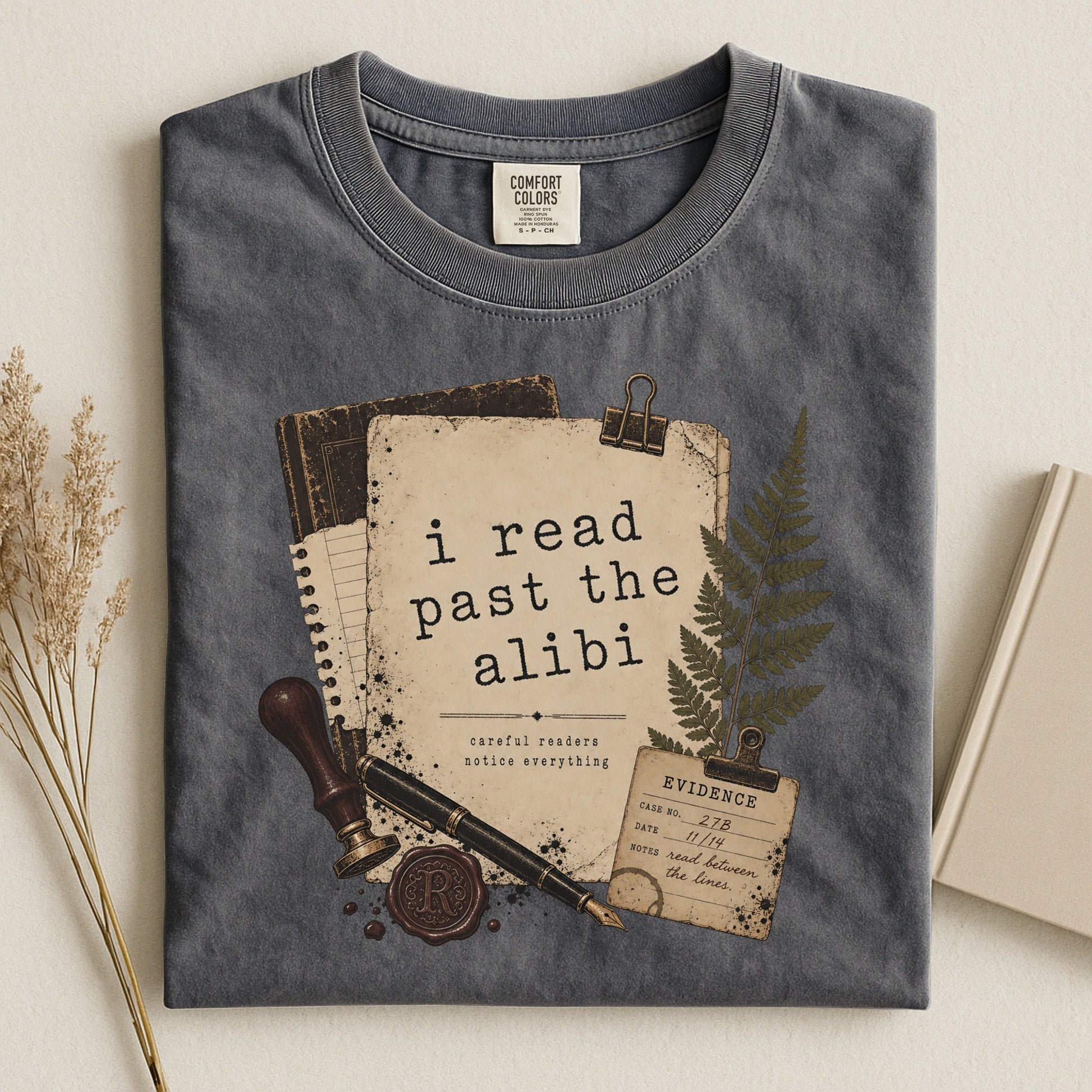 I Read Past the Alibi bookish tee in Pepper, flat lay