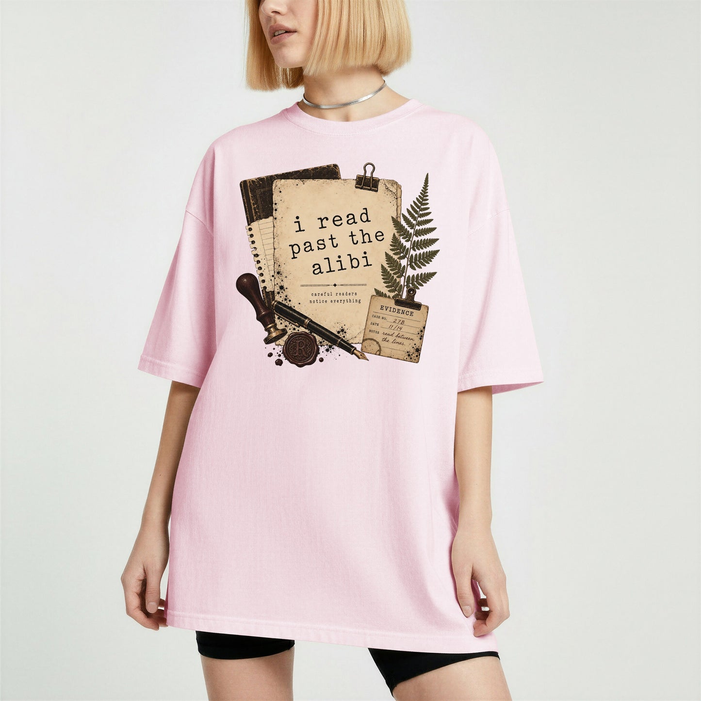 I Read Past the Alibi bookish tee in Blossom, worn