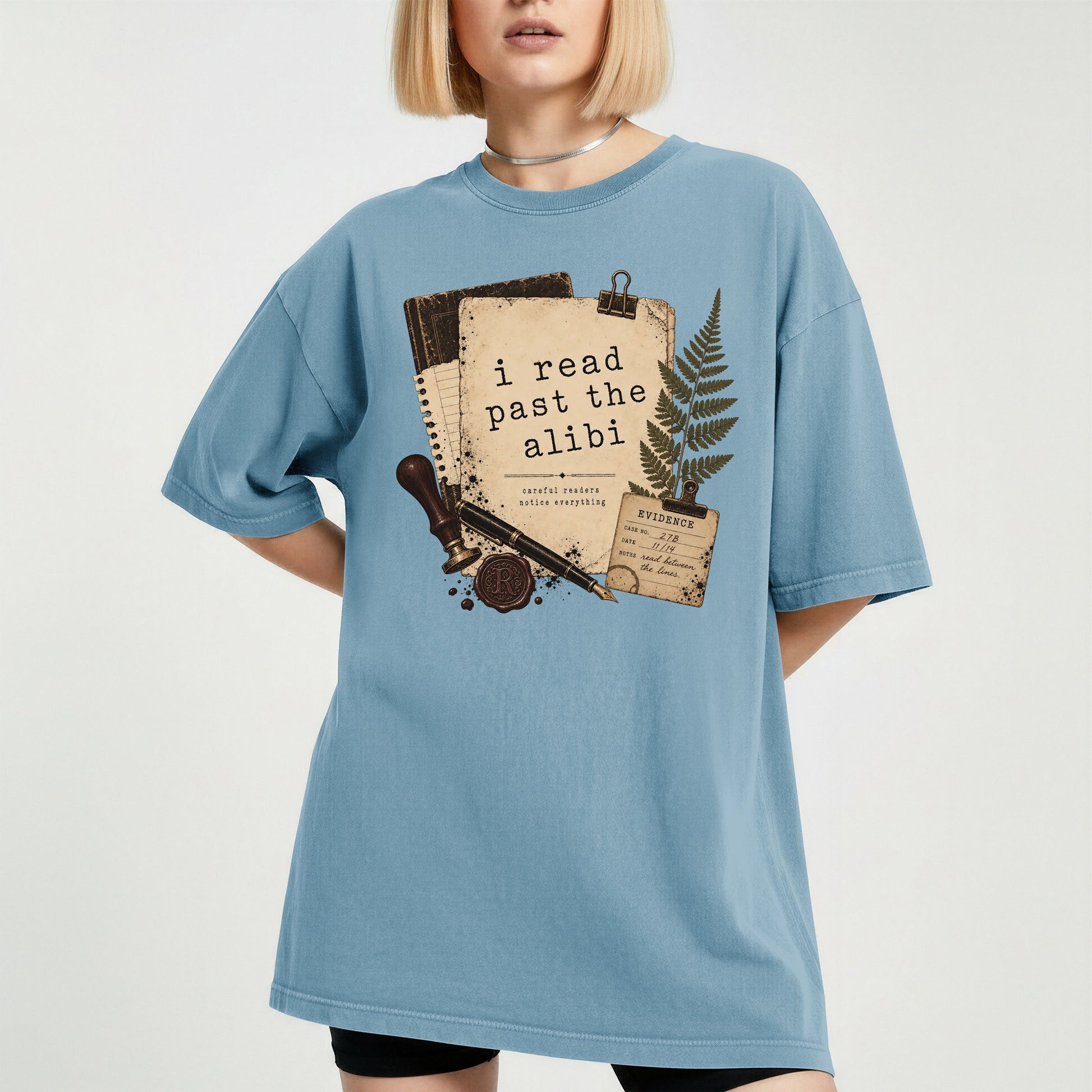 I Read Past the Alibi bookish tee in Ice Blue, worn