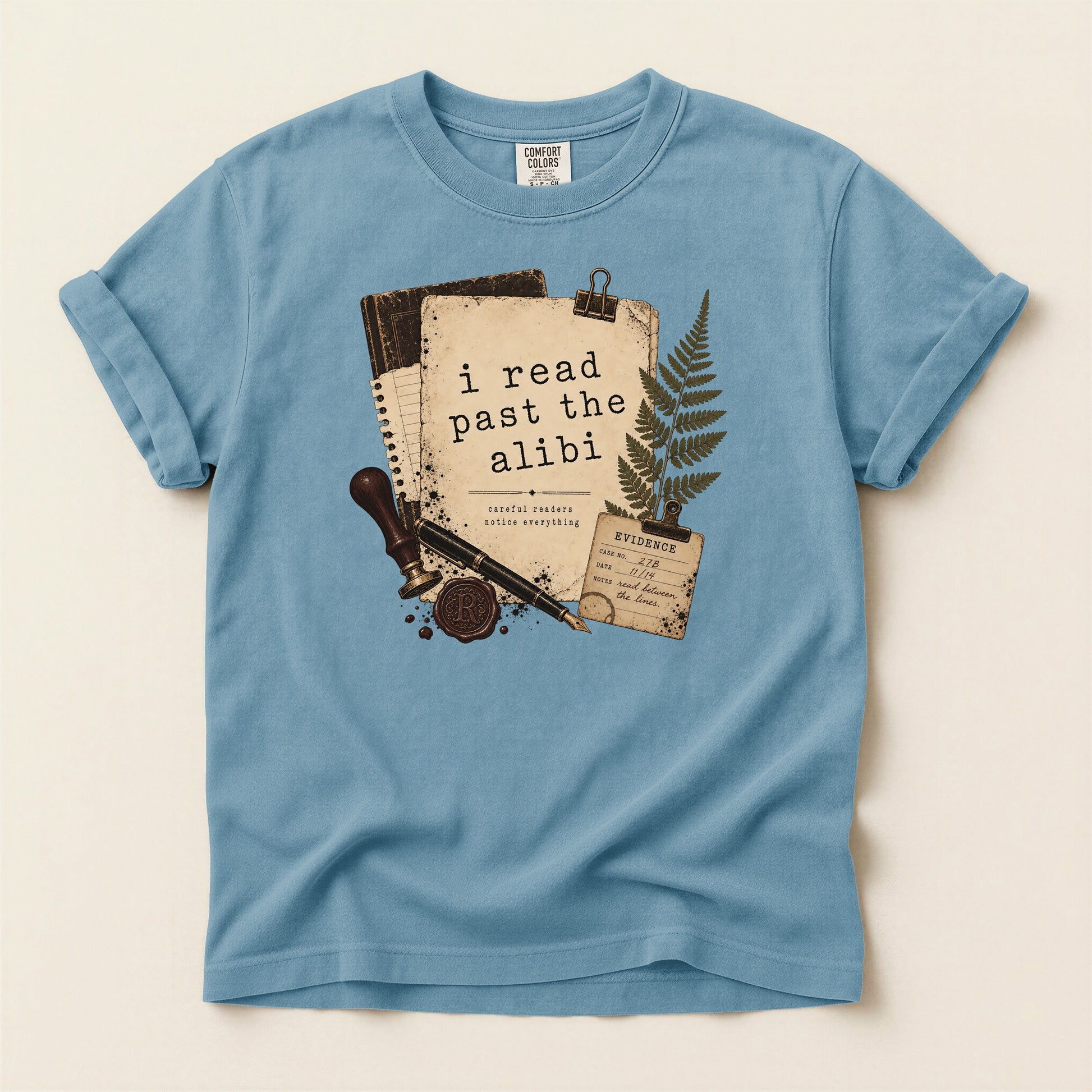 I Read Past the Alibi bookish tee in Ice Blue, full flat