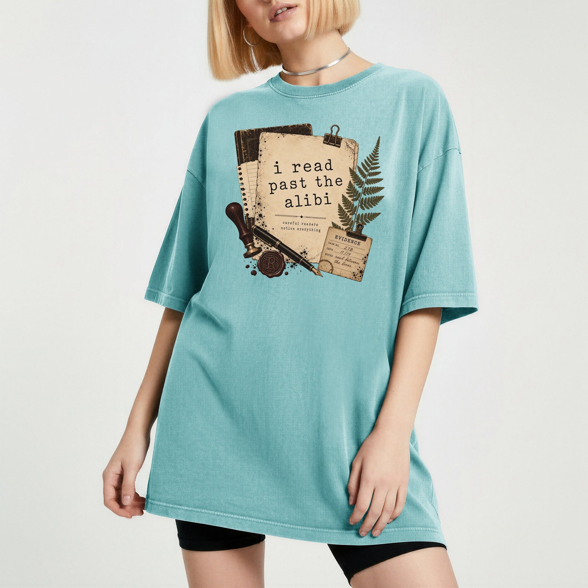 I Read Past the Alibi bookish tee in Seafoam, worn