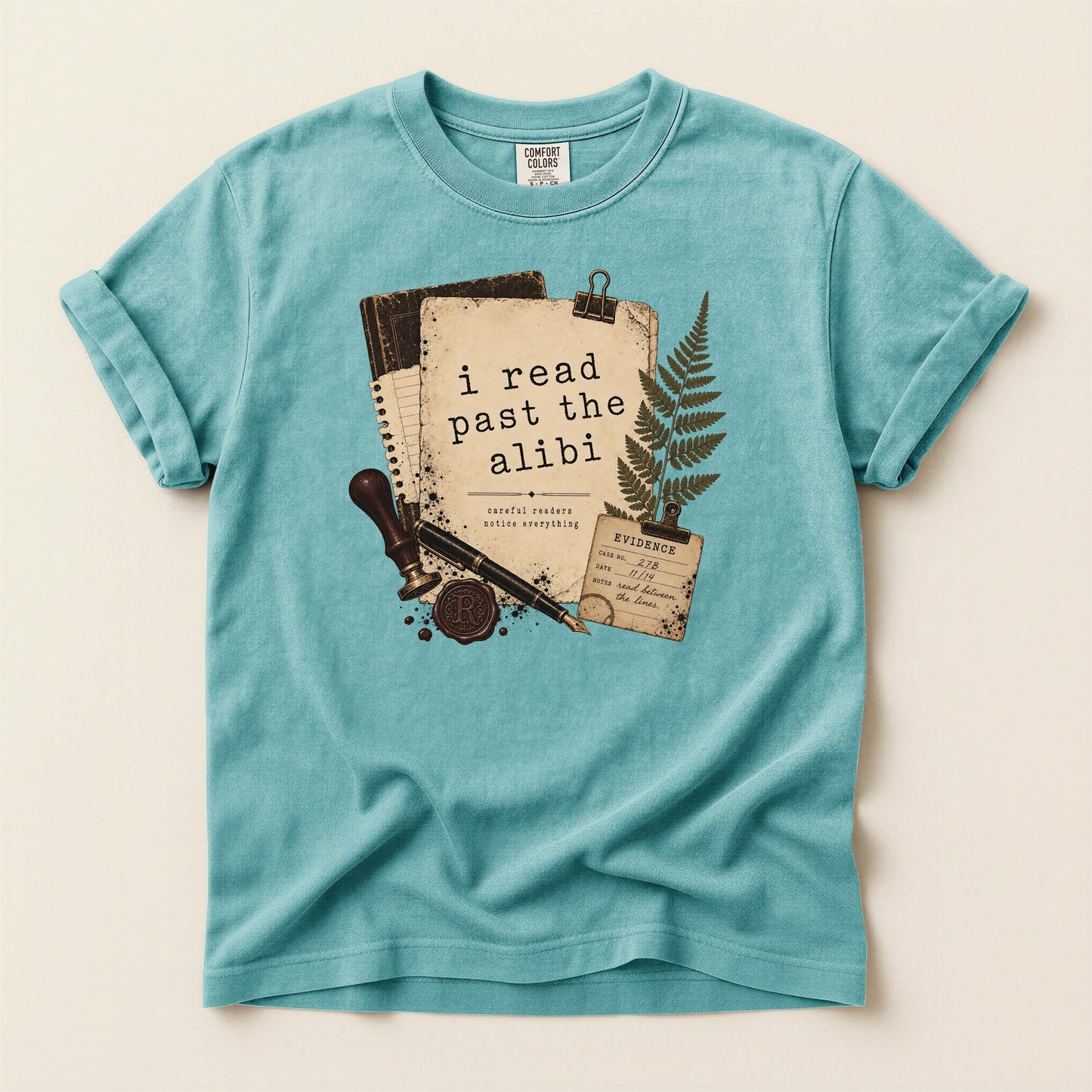 I Read Past the Alibi bookish tee in Seafoam, full flat