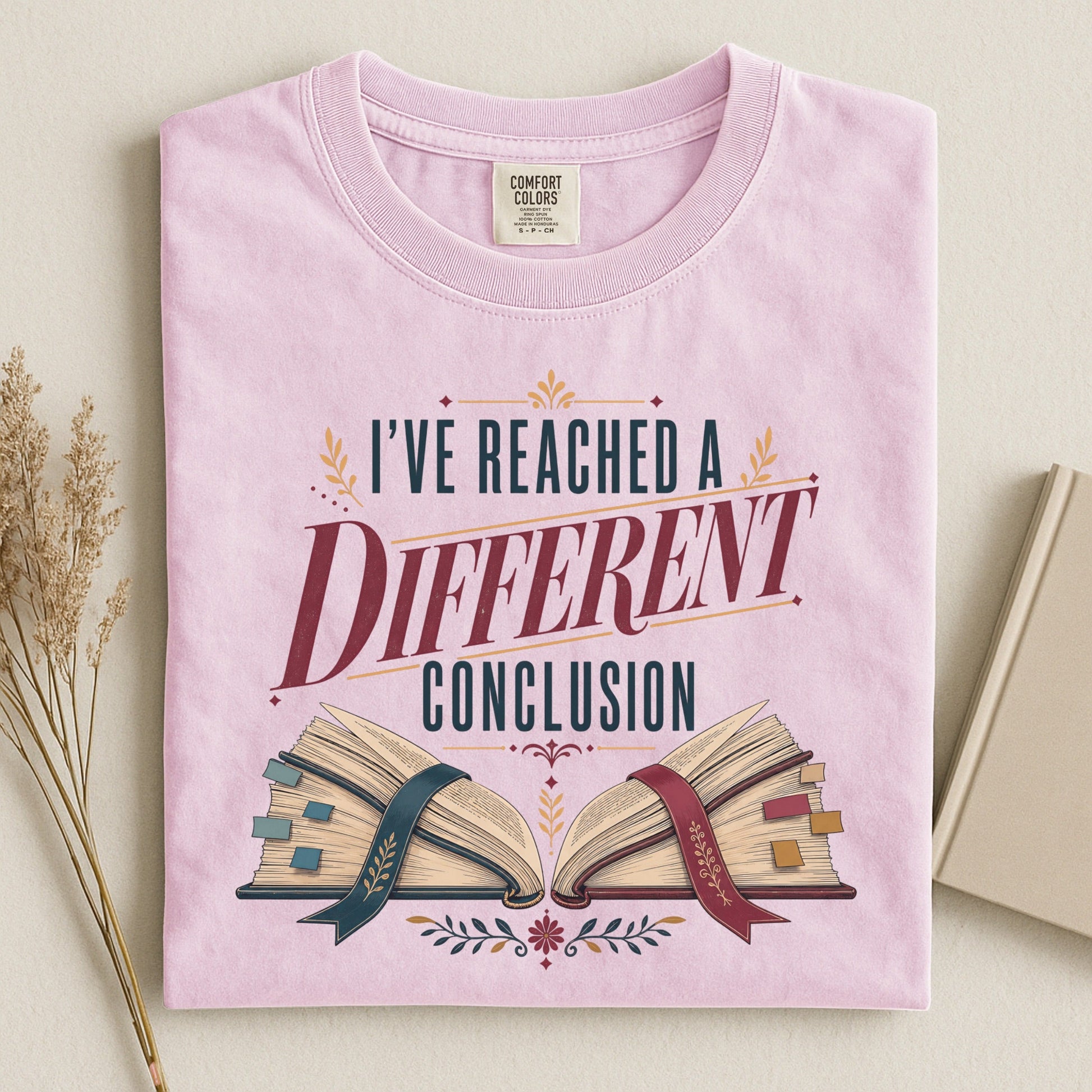 I've Reached a Different Conclusion bookish tee in Blossom, flat lay