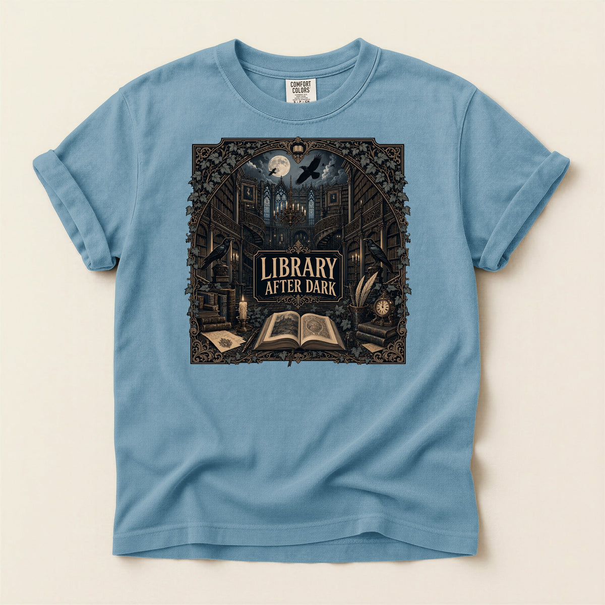 Library After Dark bookish tee in Ice Blue, full flat