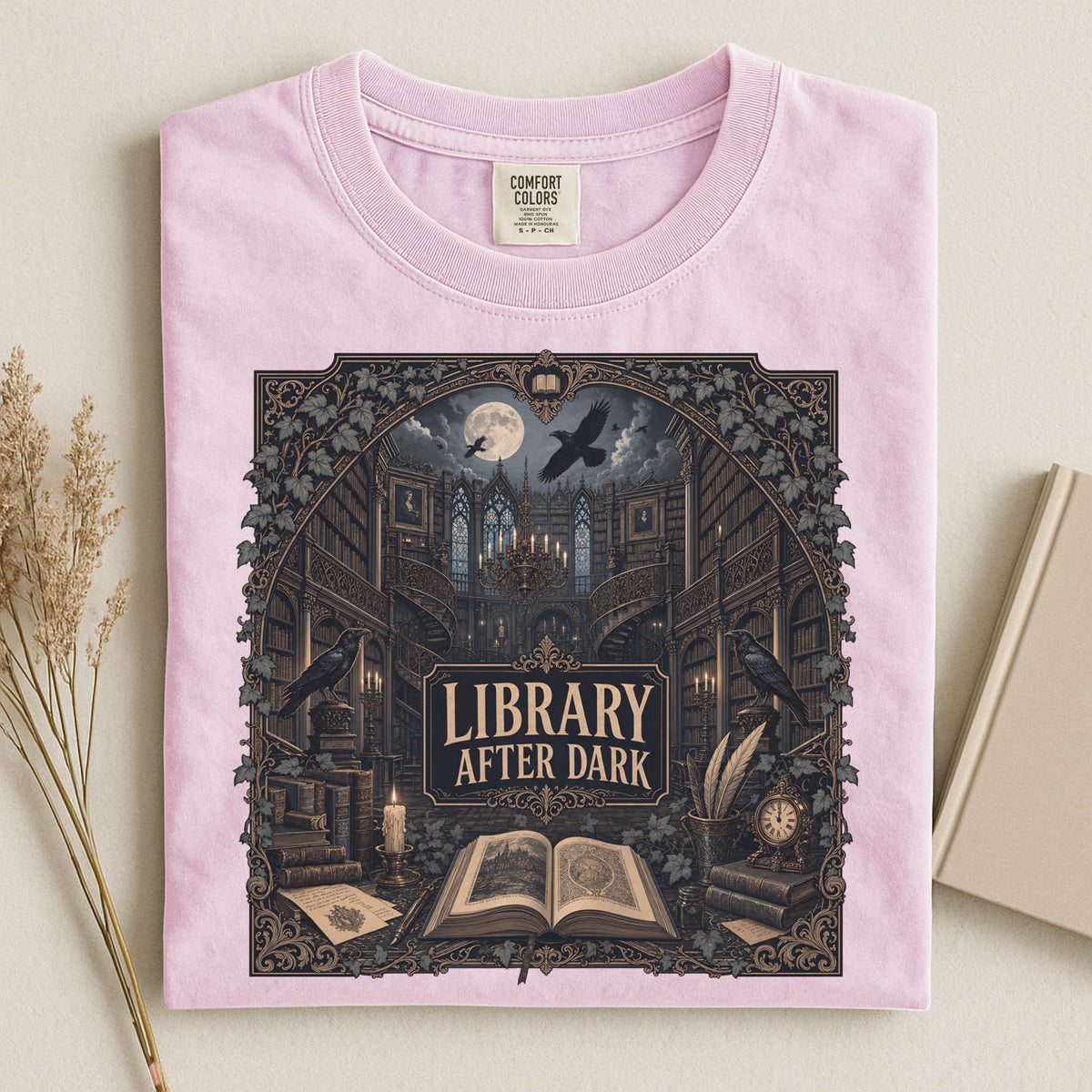 Library After Dark bookish tee in Blossom, flat lay