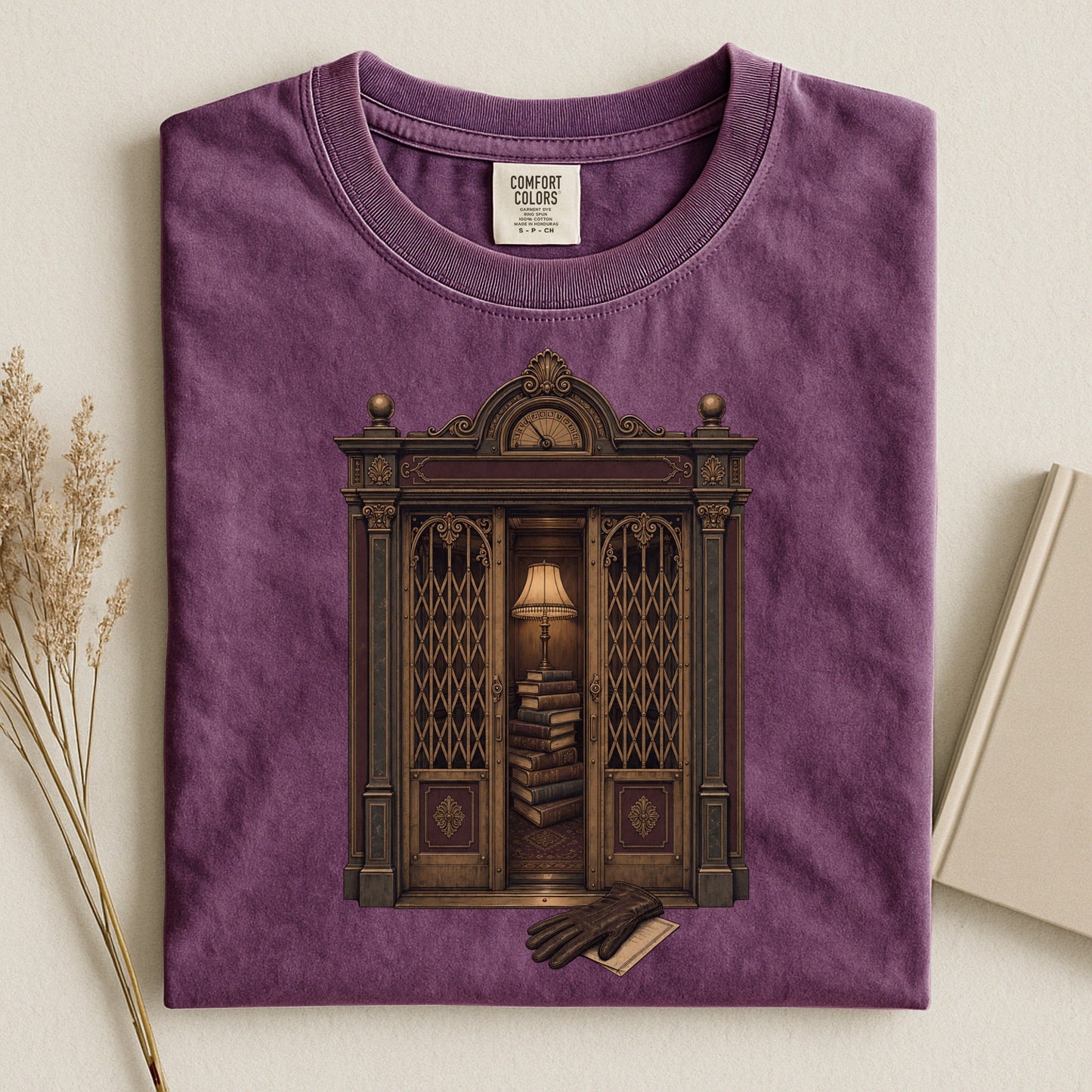 Library Alcove bookish tee in Berry, flat lay