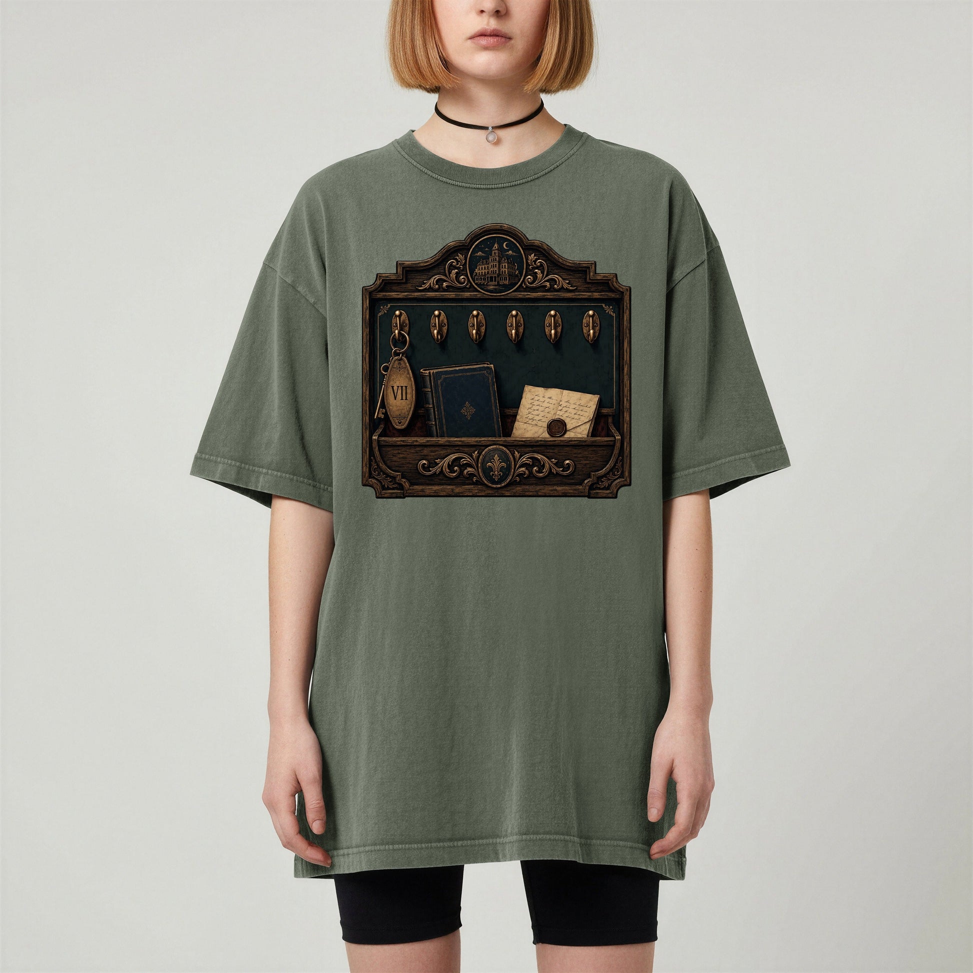 Library Key Board bookish tee in Moss, worn