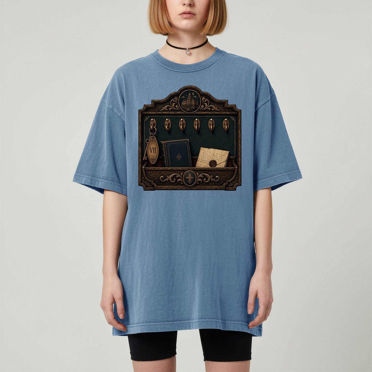 Library Key Board bookish tee in Blue Jean, worn