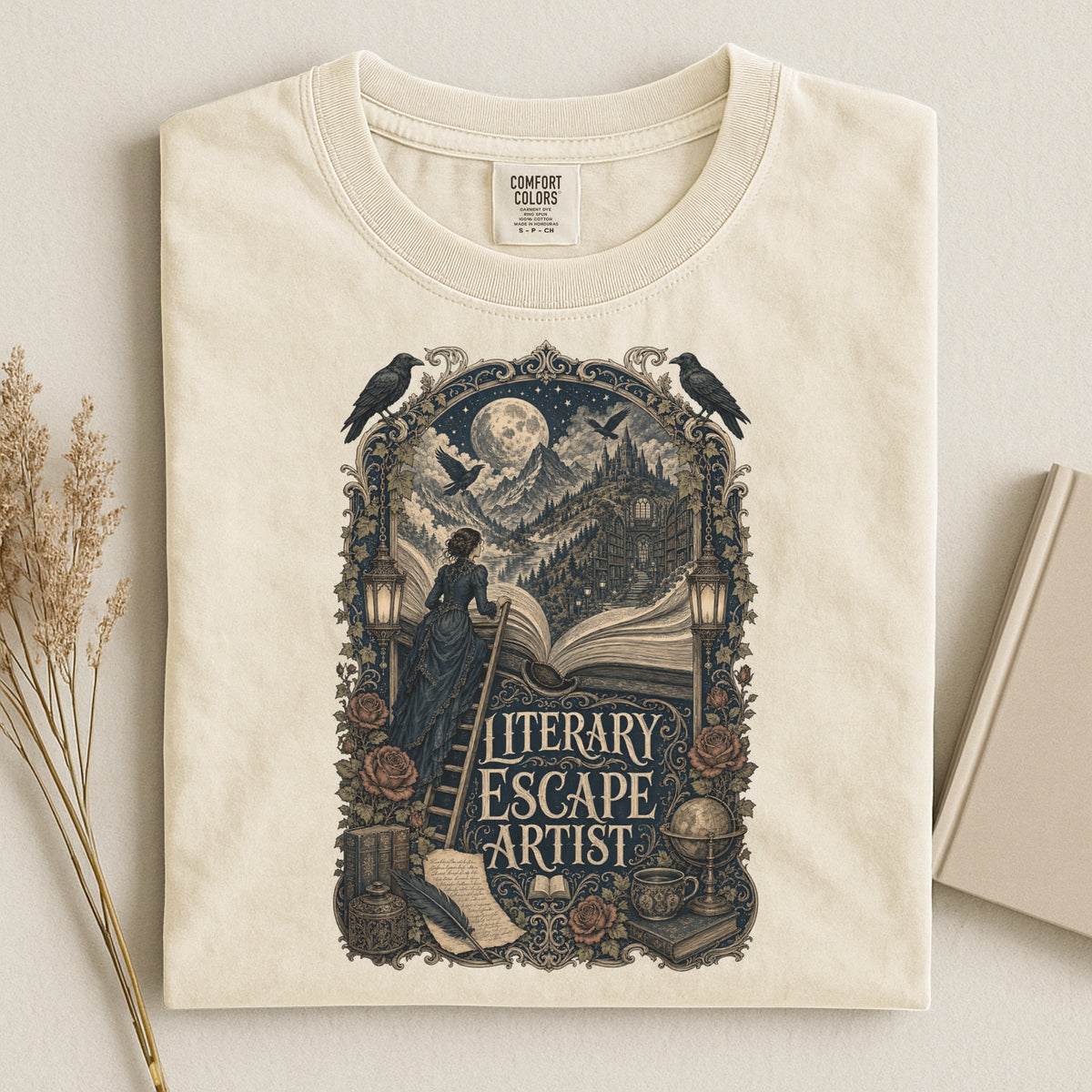 Literary Escape Artist bookish tee in Ivory, flat lay