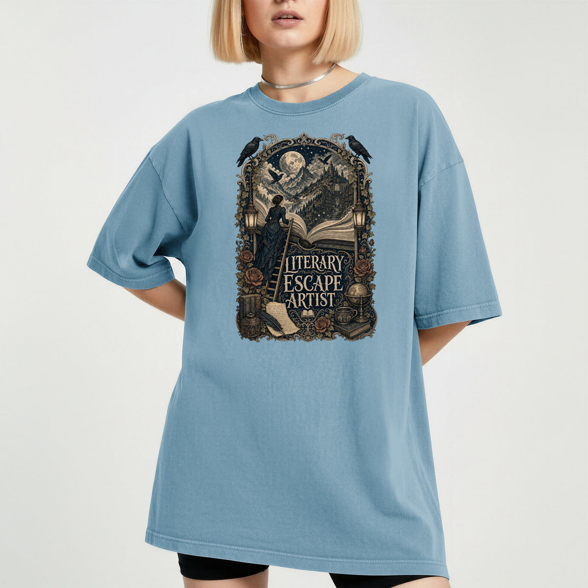 Literary Escape Artist bookish tee in Ice Blue, worn
