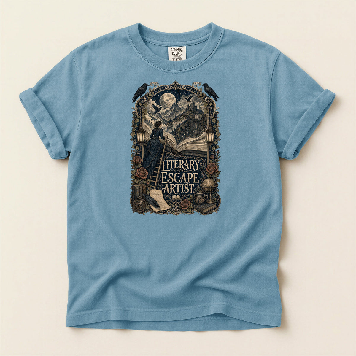 Literary Escape Artist bookish tee in Ice Blue, full flat
