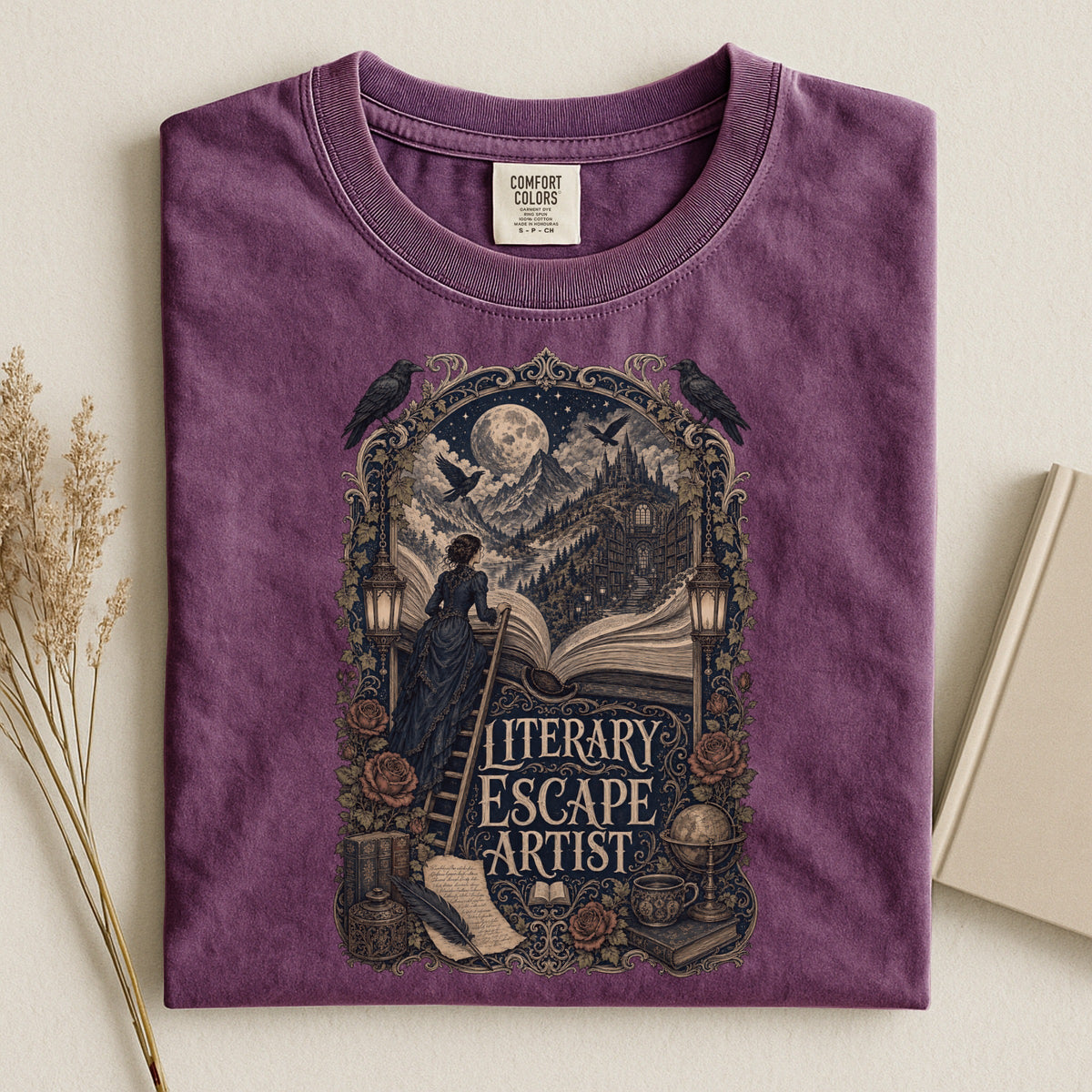 Literary Escape Artist bookish tee in Berry, flat lay