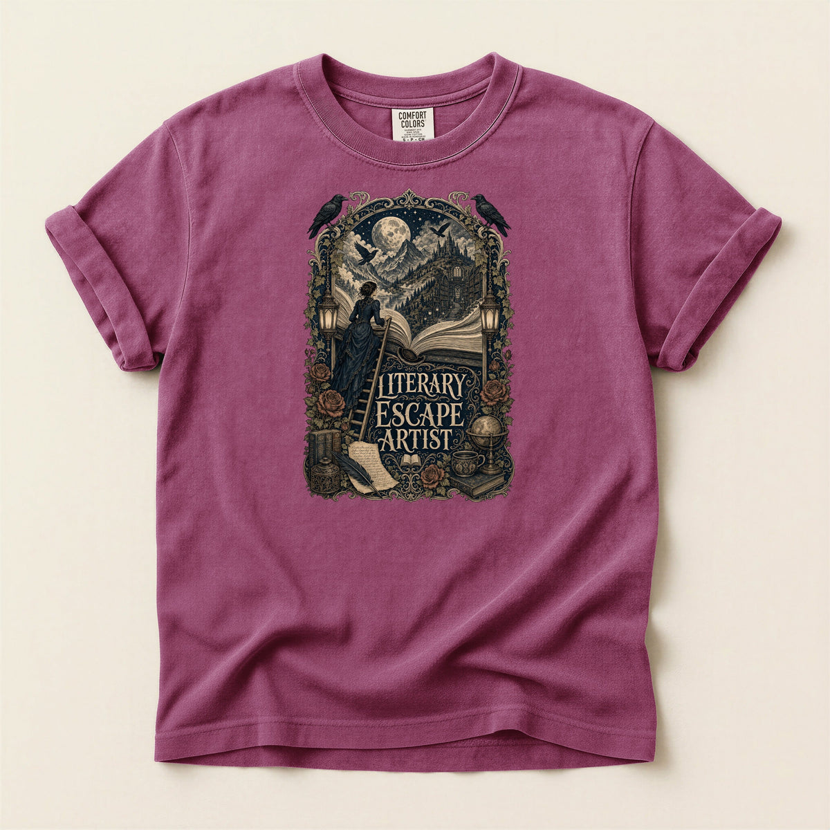 Literary Escape Artist bookish tee in Berry, full flat