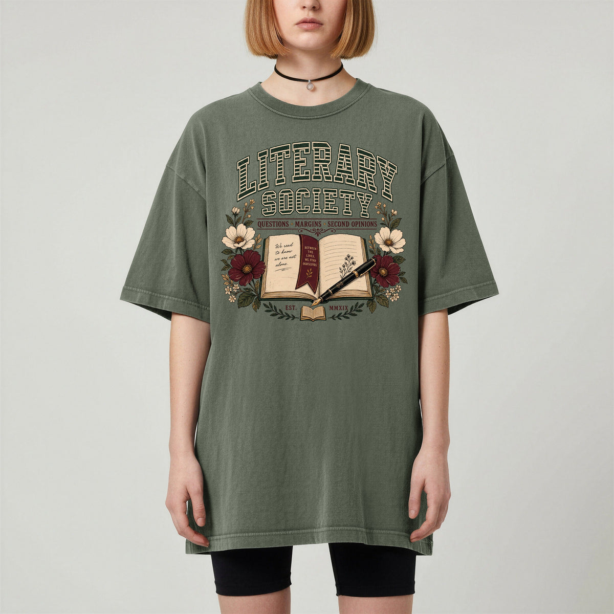 Shelf Love Studio Literary Society t-shirt in Moss, worn
