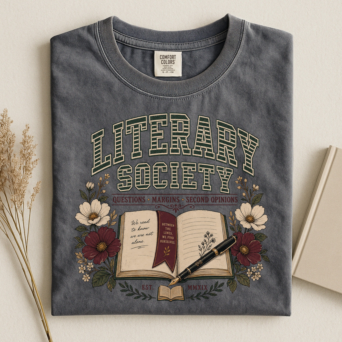 Shelf Love Studio Literary Society t-shirt in Pepper, styled flat lay