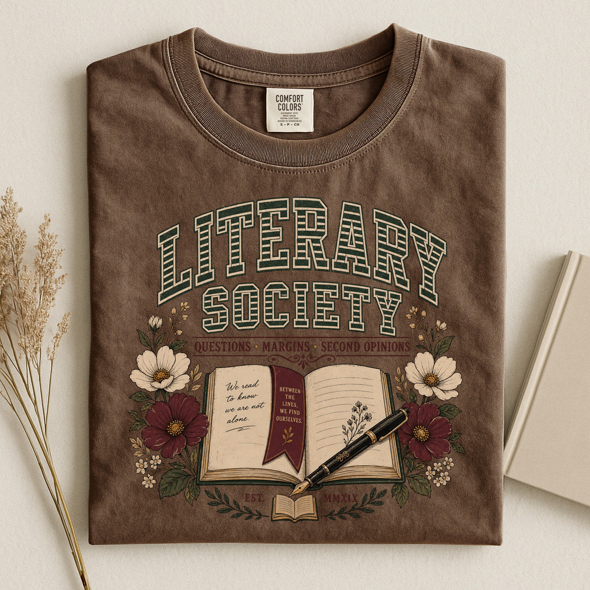 Shelf Love Studio Literary Society t-shirt in Espresso, styled flat lay