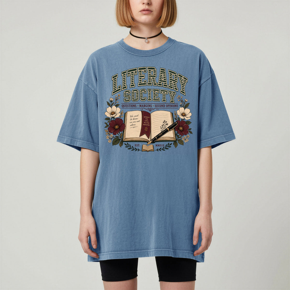 Shelf Love Studio Literary Society t-shirt in Blue Jean, worn