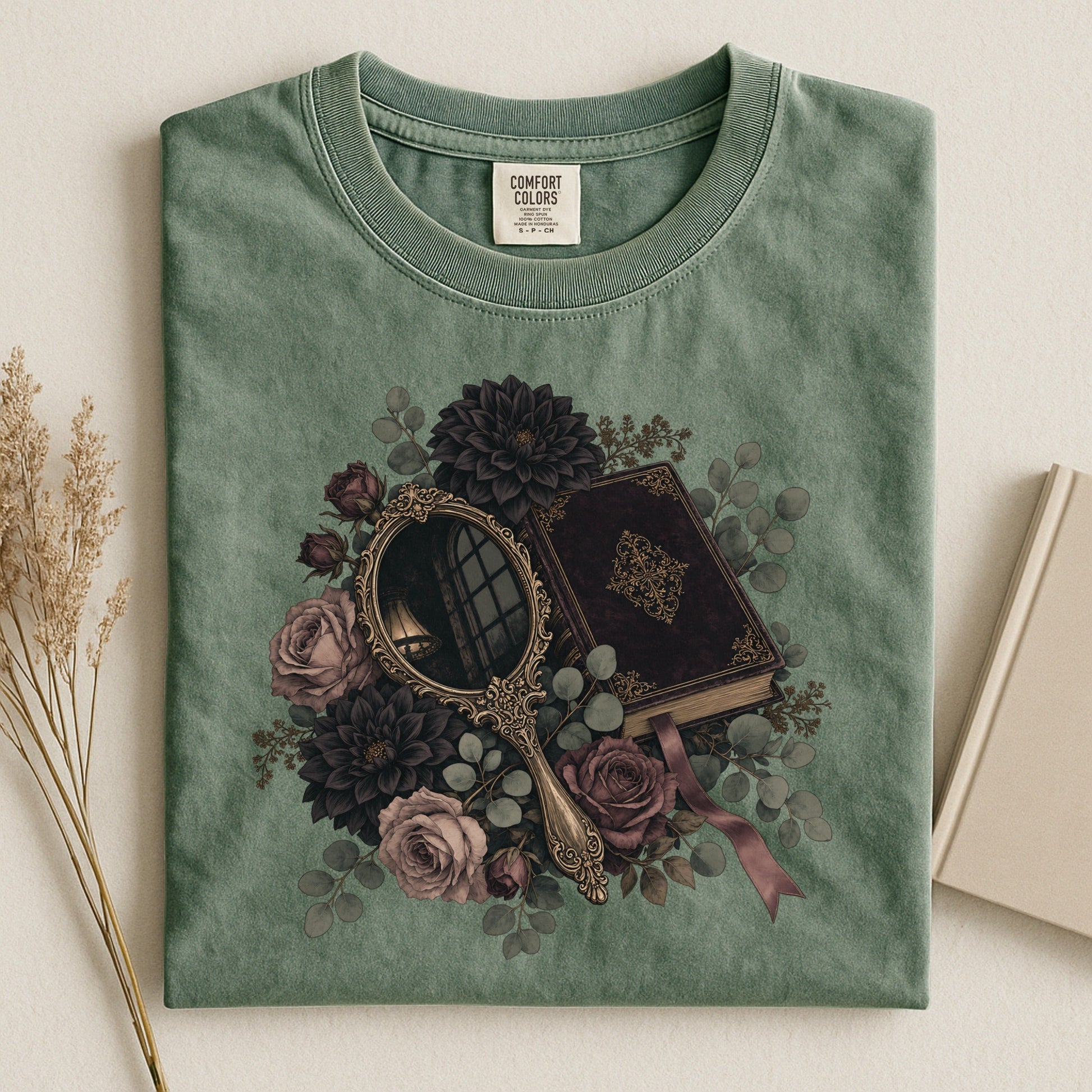 Moody Mirror and Roses bookish tee in Moss, flat lay